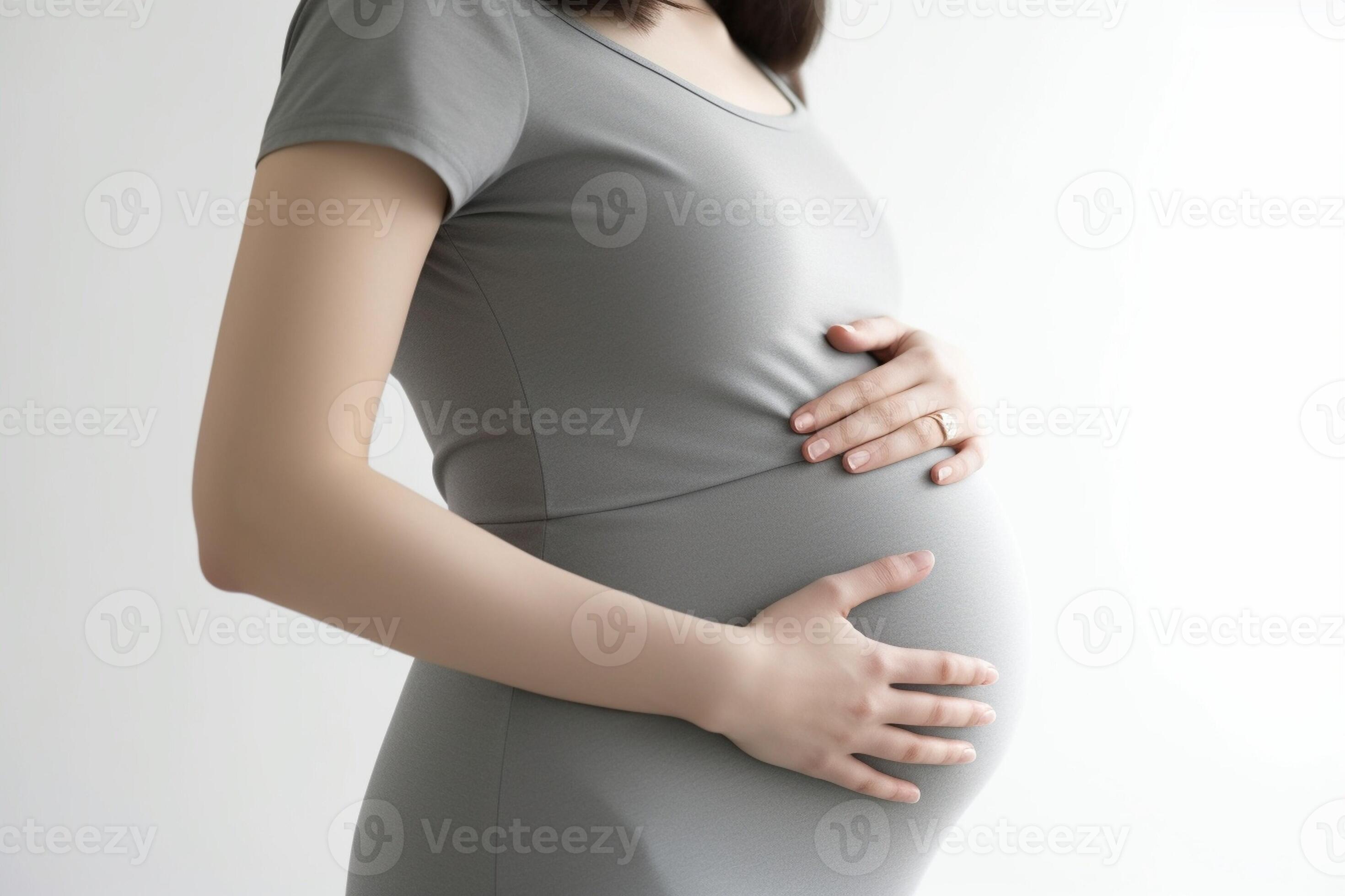 Applying moisturizer Cropped image of pregnant woman applying