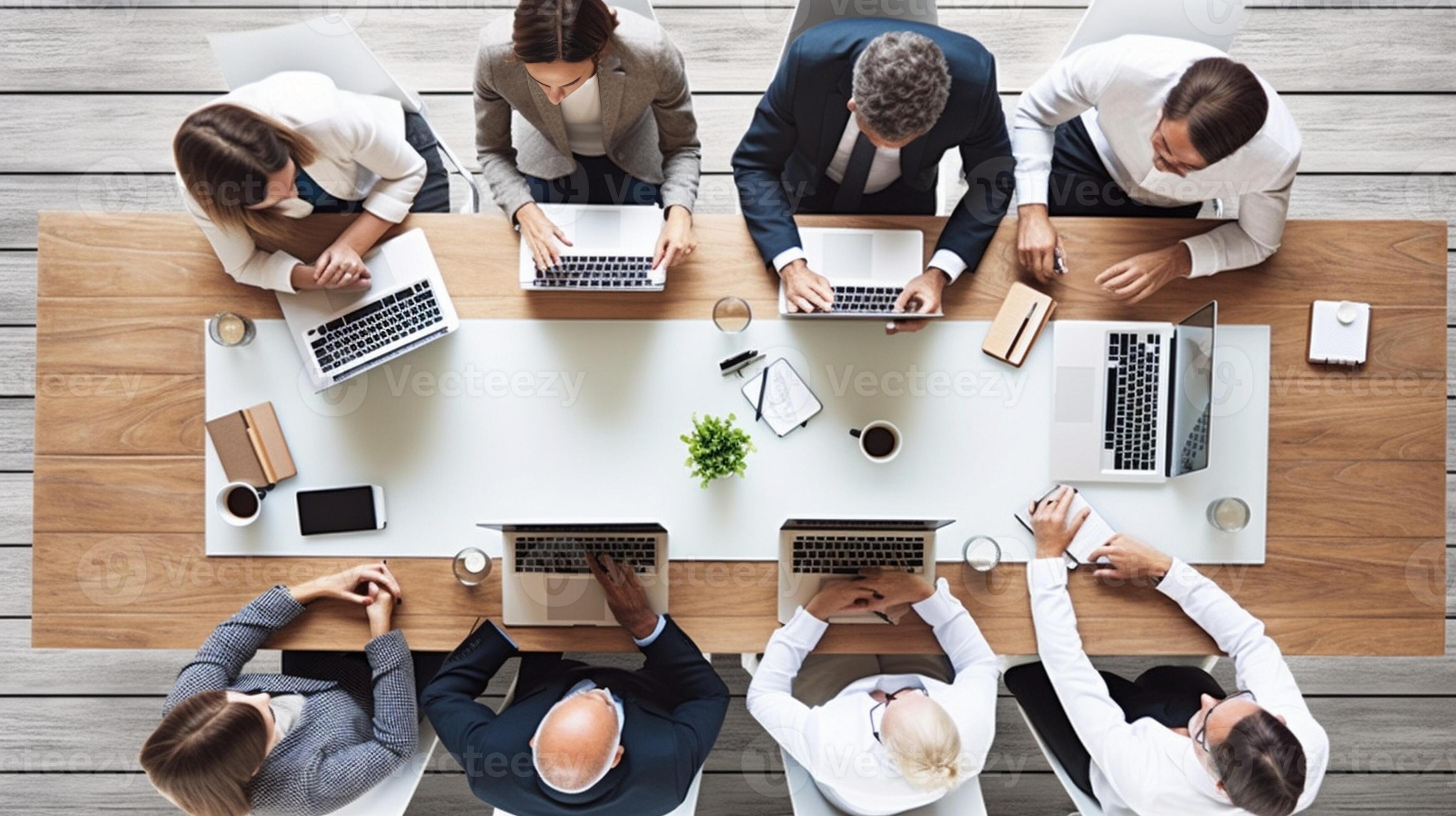Busy working in office Top view of group of young business people in