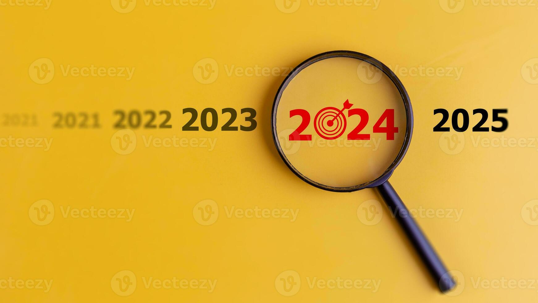 Target of business concept. magnifier focusing on the year 2024. Focus