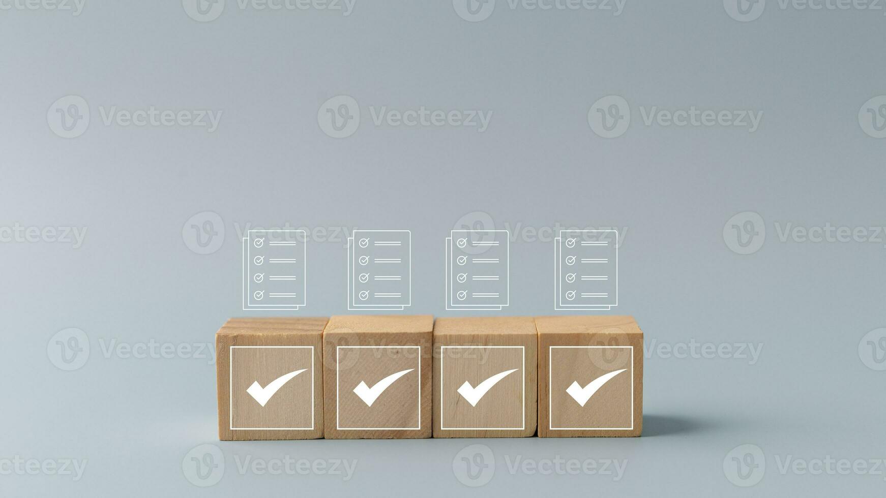 Wooden cubes with check box icon. Assessment, questionnaire, evaluation, online survey online exam choose the right answer in the exam, filling out an online survey form. photo