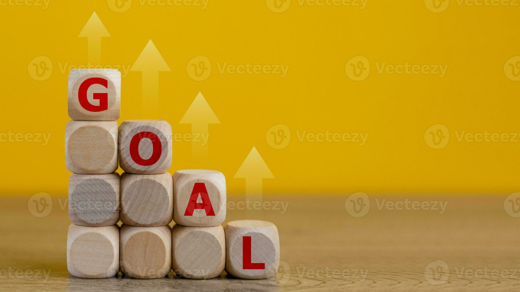 Business goal concept. goal and arrow up a sign on wooden blocks, Business strategy planning management, Business process workflow development. photo