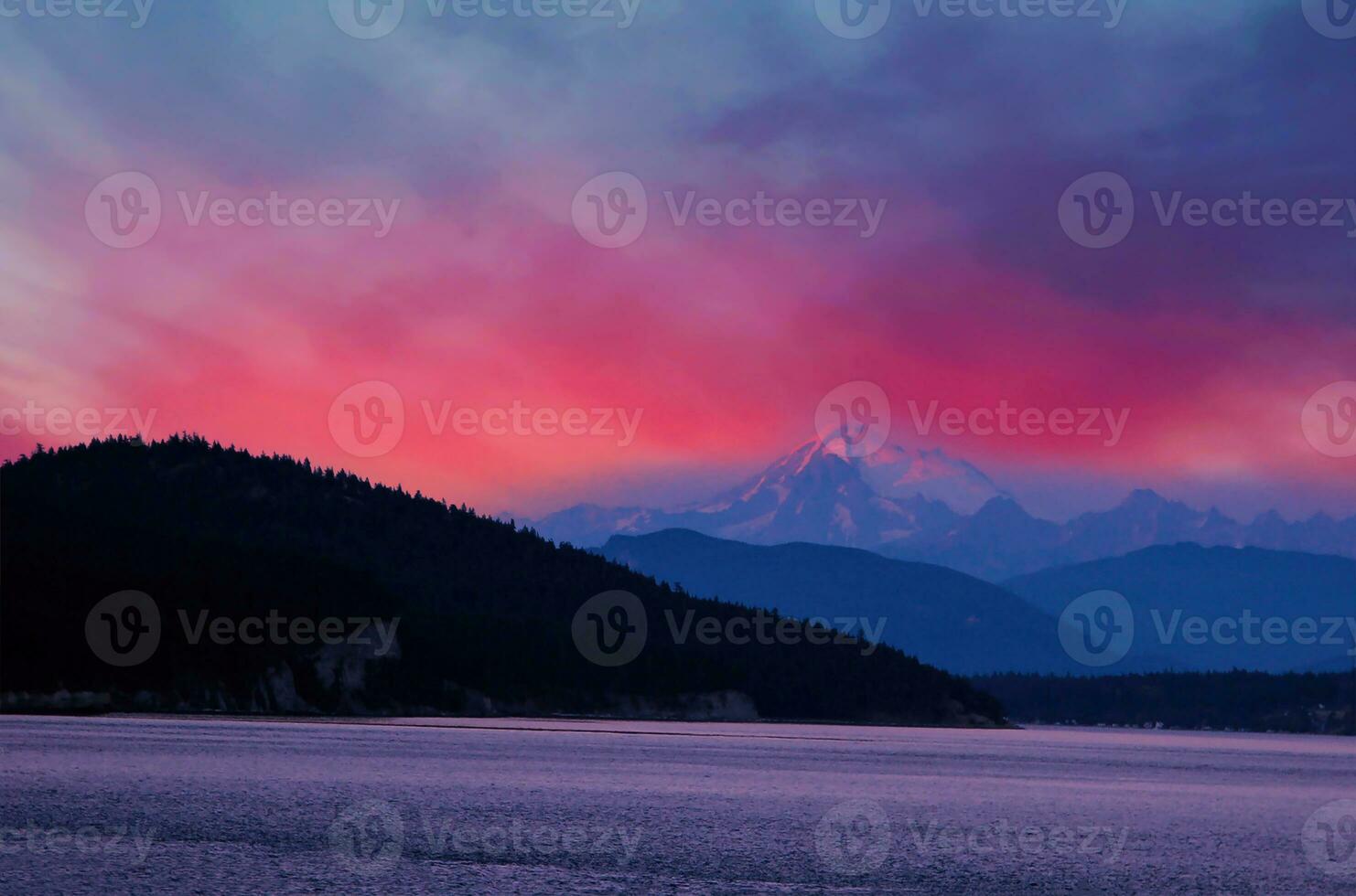 Scenic view of snowcapped mountains against sky with the  Multicolored Misty Rainbow before sunrise photo