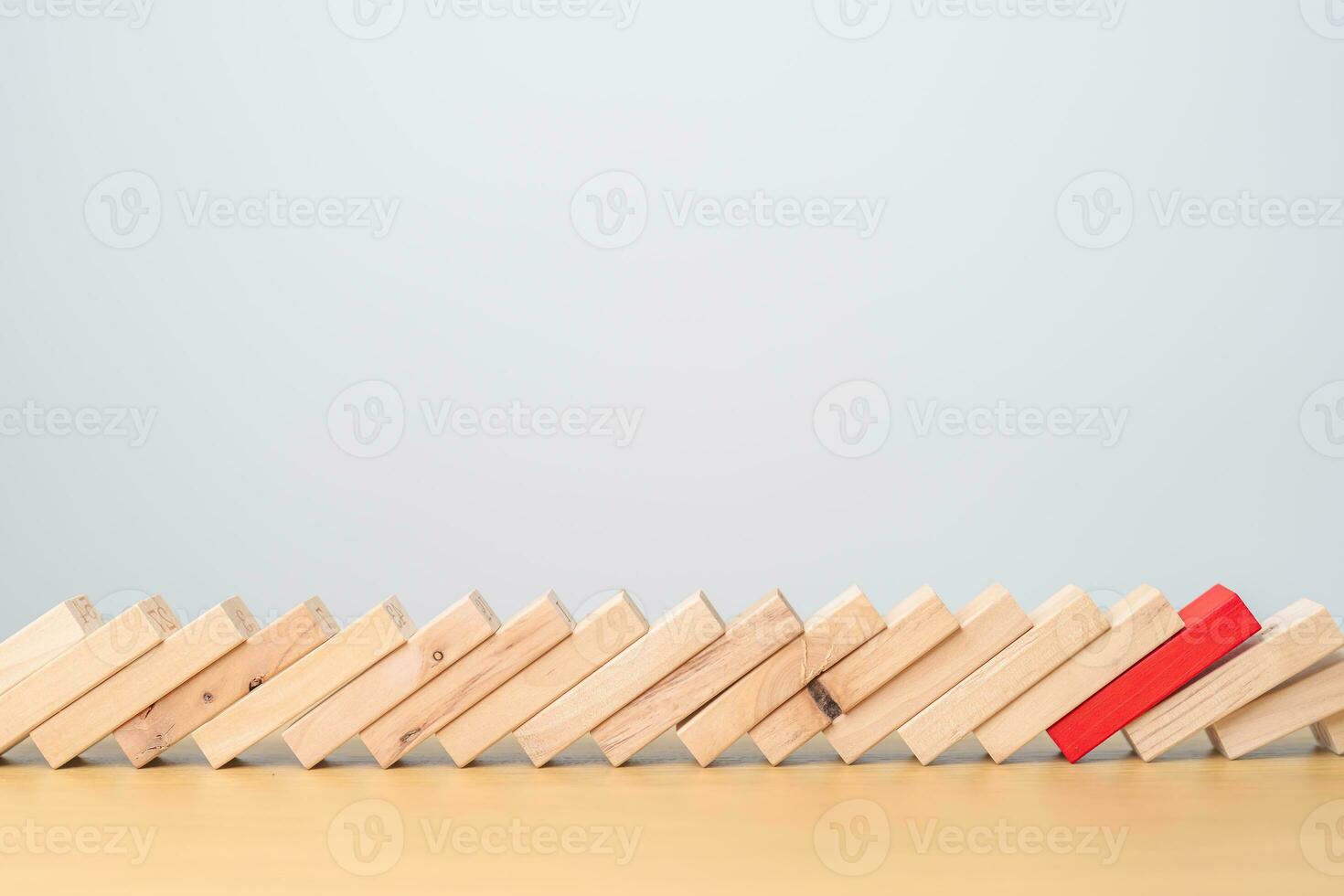 wood domino blocks falling on table. Crisis, fall Business, Risk management, Economic recession, Strategy and solutions concept photo