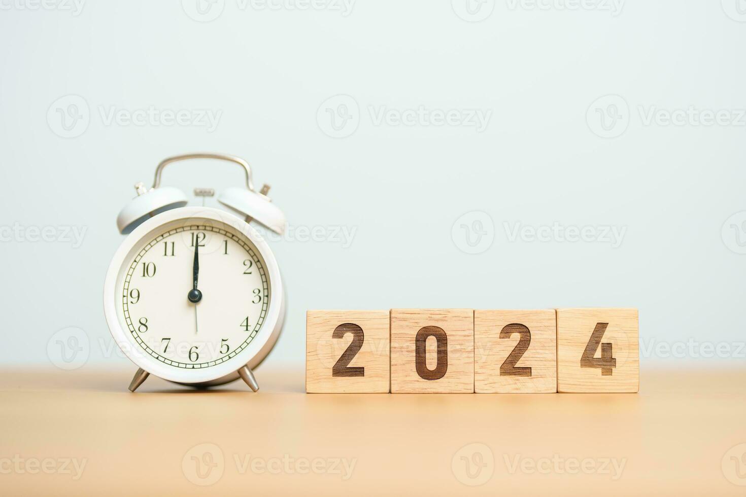 Happy New Year with vintage alarm clock and 2024 block. Christmas, New Start, Resolution, countdown, Goals, Plan, Action and Motivation Concept photo