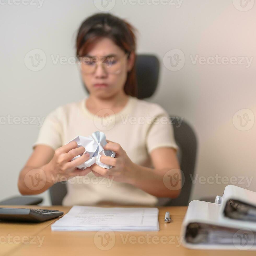 stressed Asian Woman with mistake paper, Tired female businesswoman working overload at office, Exhausted casual woman with documents folder stack at late night in home. Failure, Problem and business photo