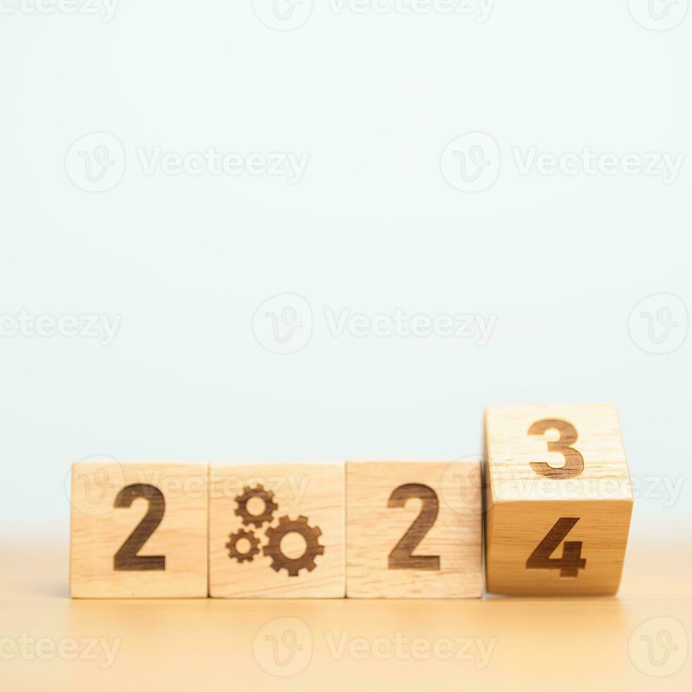 2024 block with gear icon. Business Process, Team, teamwork, Goal, Target, Resolution, strategy, plan, Action, motivation, change, brainstorm and New Year start concepts photo