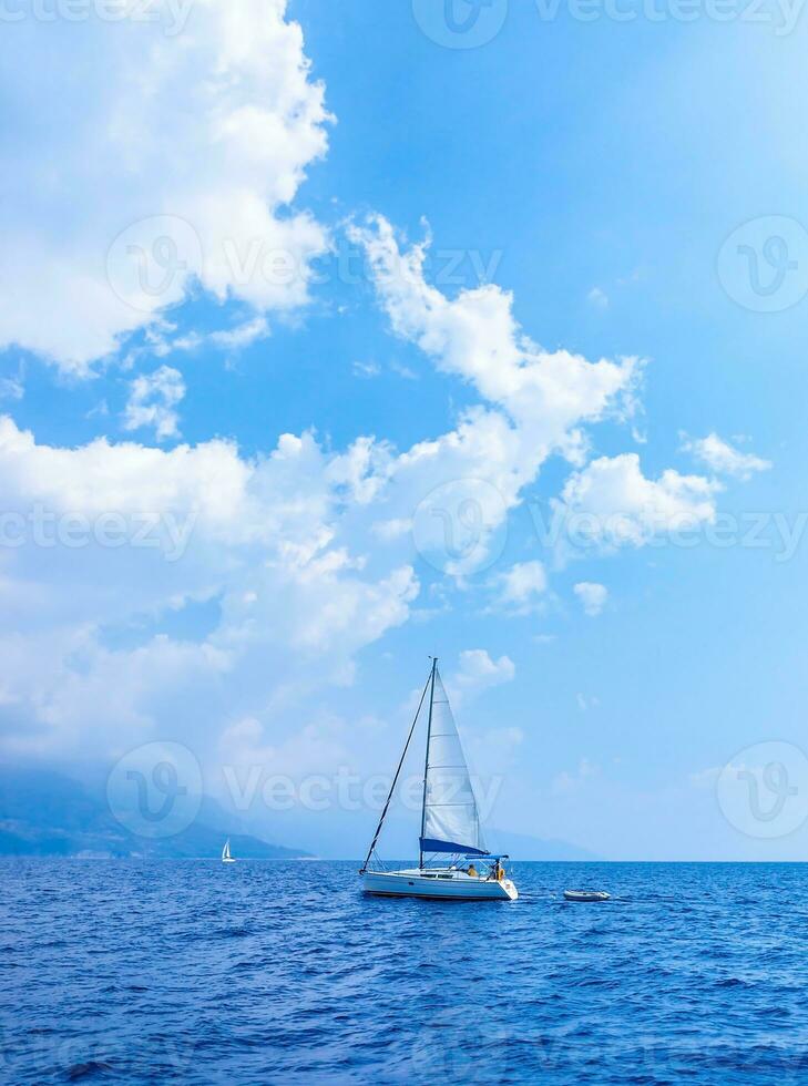 Sail yacht in the sea photo