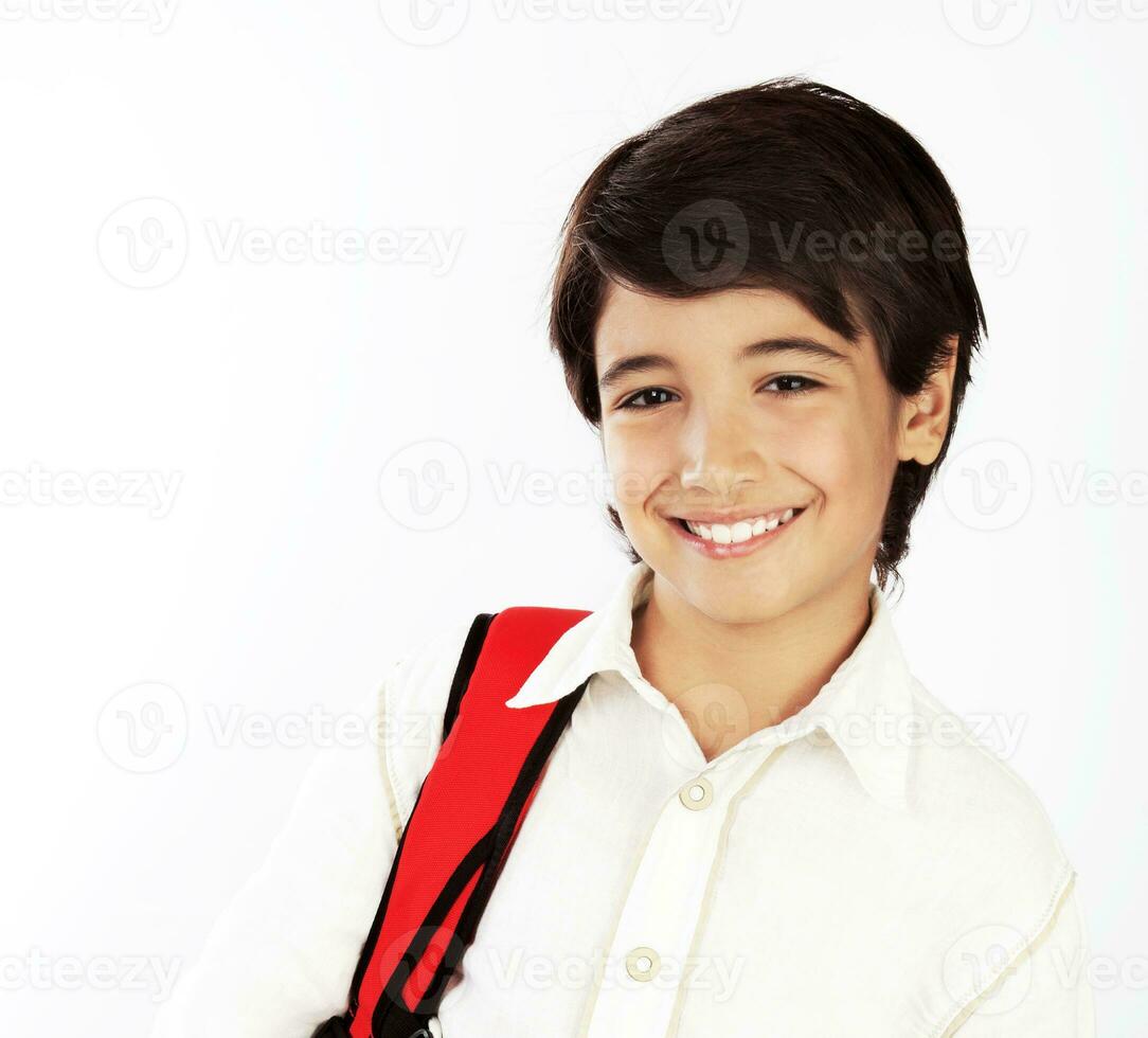 Portrait of happy schoolboy photo