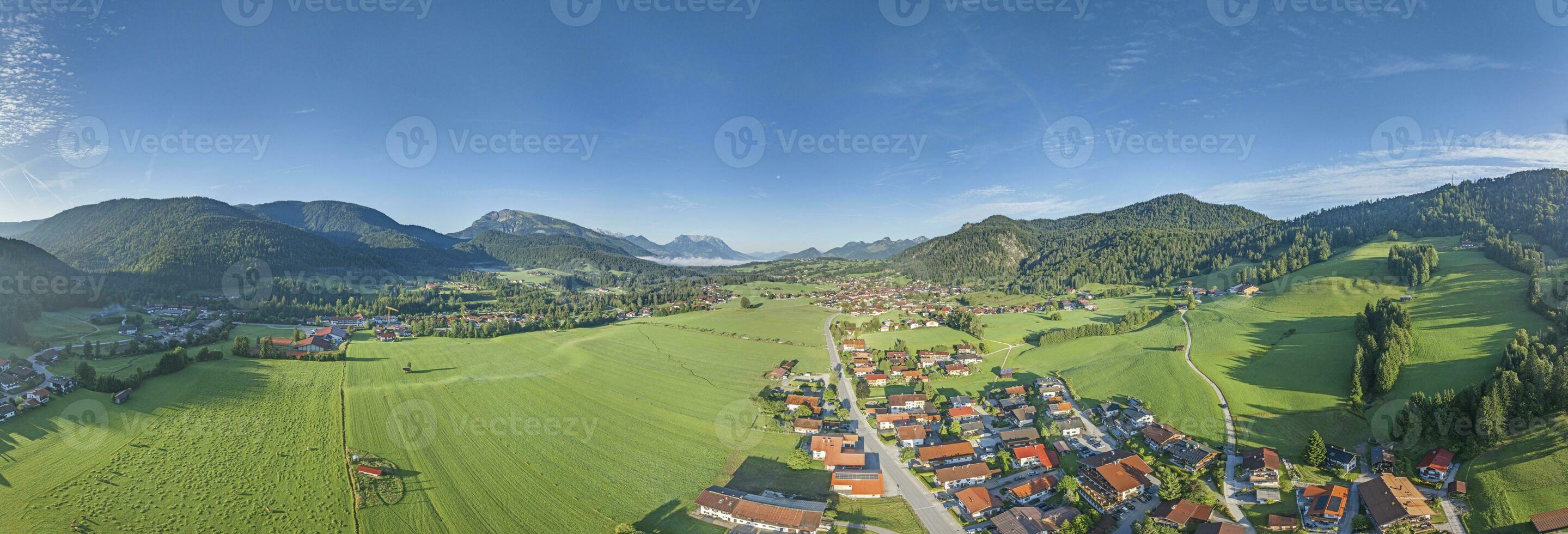 Drone panorama over Bavarian tourist village Reit im Winkl in summer photo