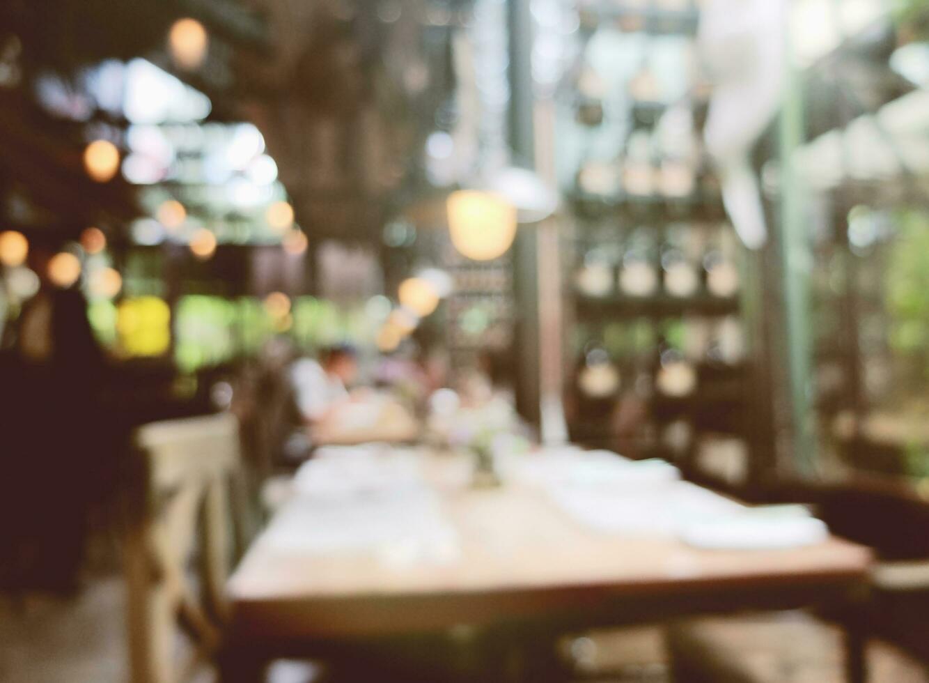 Blurred background customer at restaurant, blur background with retro filter photo