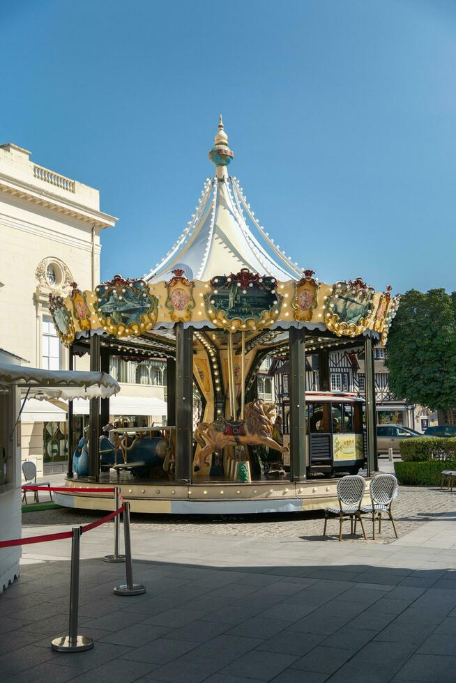 Carrousel in a luxury town photo