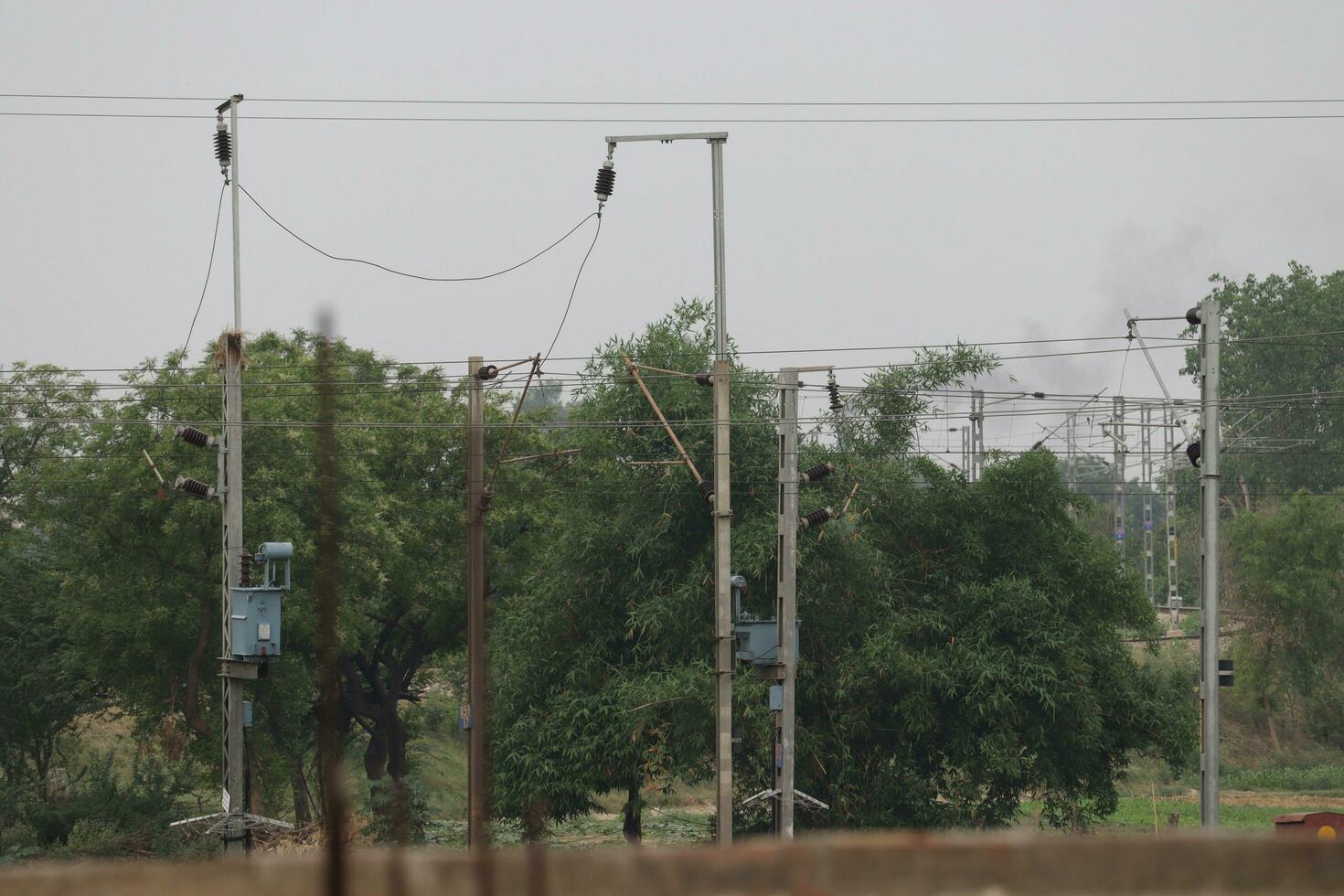 indian railway train track pole photo