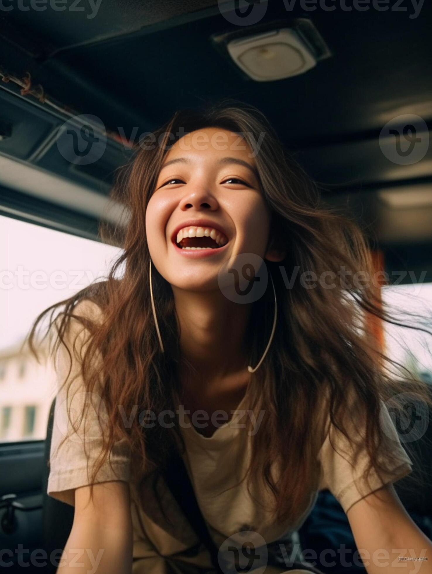 Happy to travel Attractive young woman looking out the vans window and