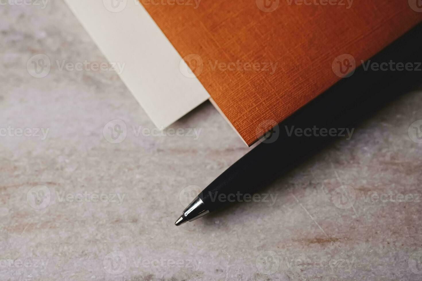 Pen and papers as office stationery photo