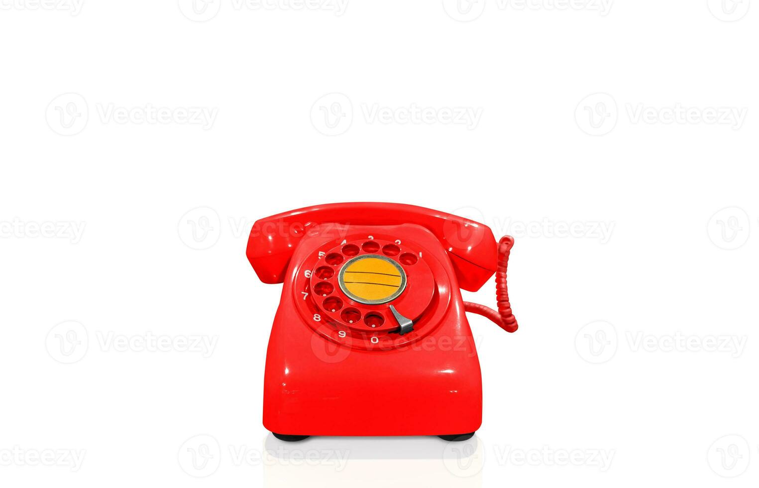 Red vintage telephone isolated on white background photo