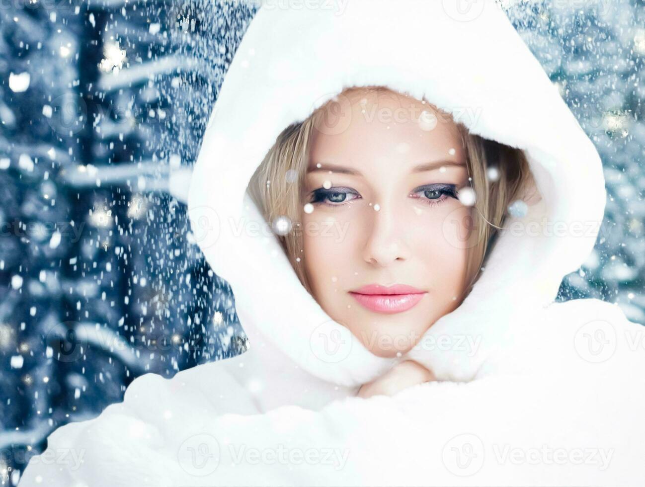 Happy holidays, lifestyle and winter fashion, beautiful woman wearing white fluffy fur coat, snowing snow in snowy forest nature as Christmas, New Year and holiday portrait photo
