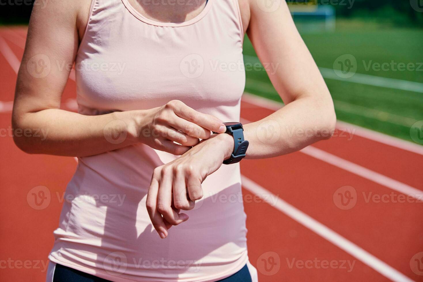 Woman use fitness smart watch, checking results after sport training photo