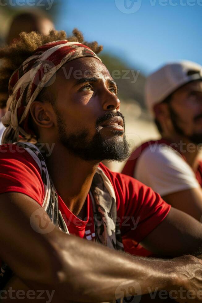 Sad Omani beach soccer fans photo