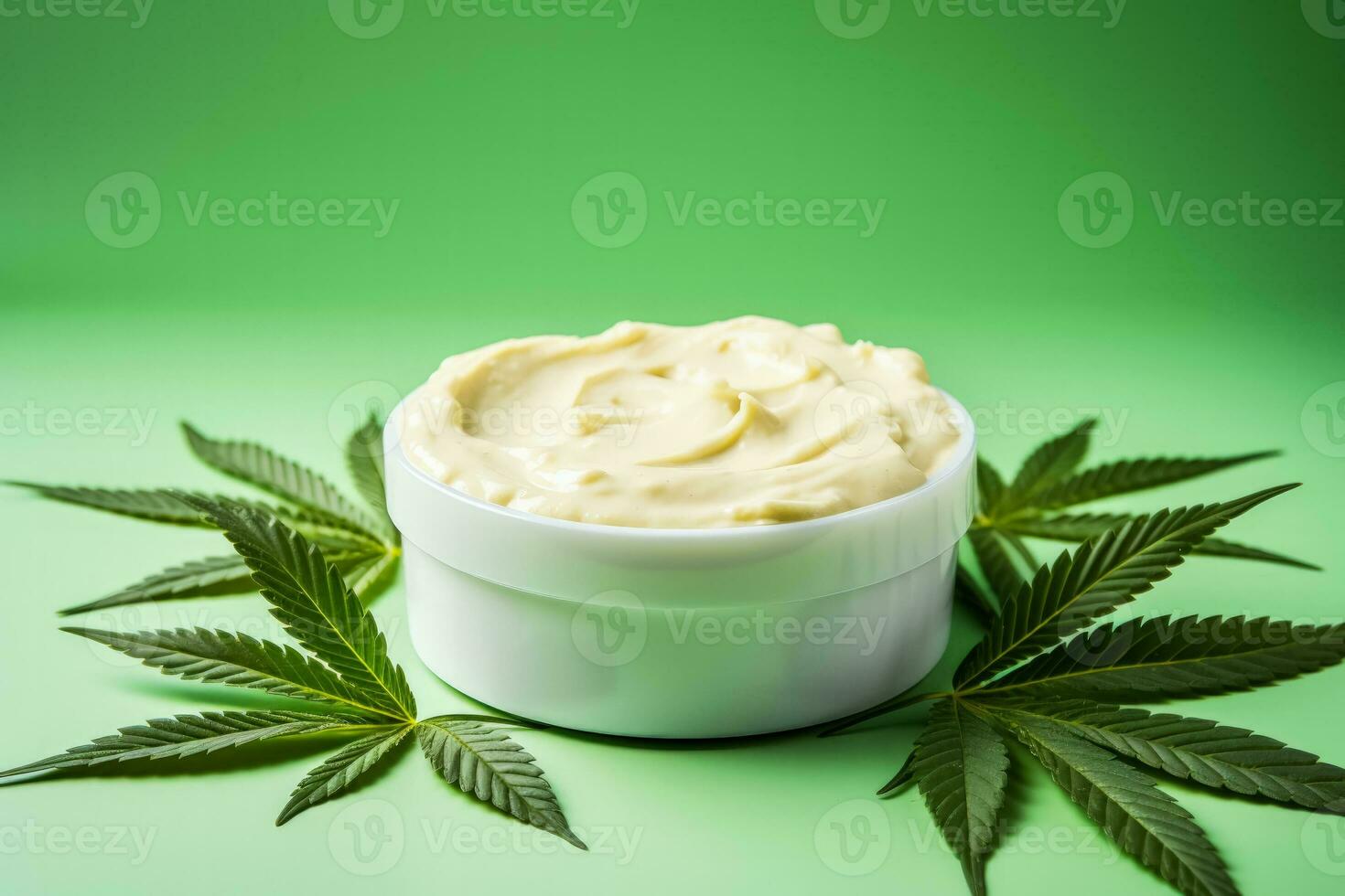 Cream with cannabis isolated on pastel background photo