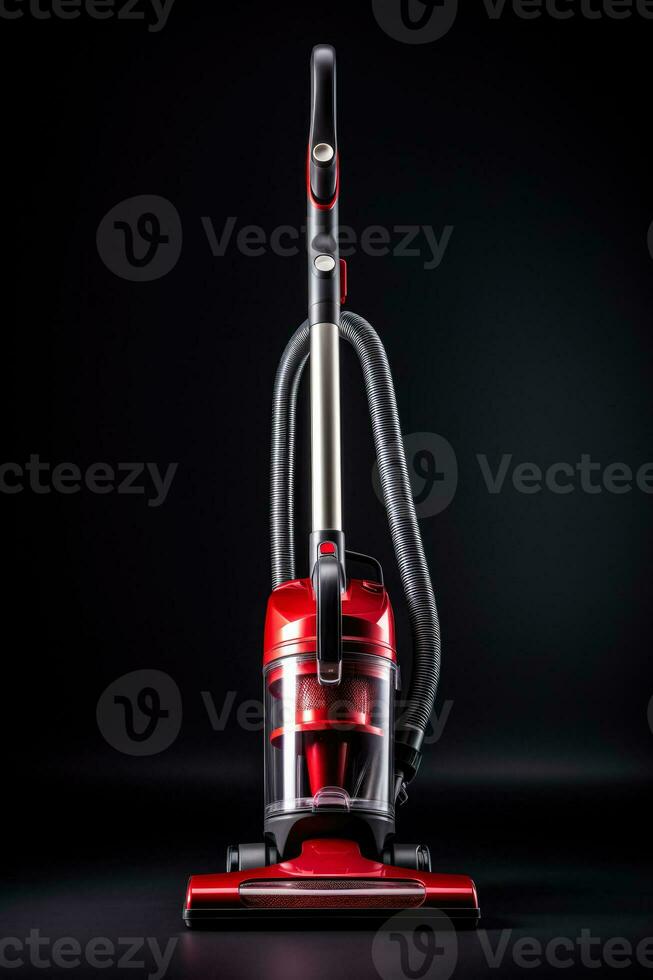 A modern professional vacuum cleaner isolated on a red gradient background photo