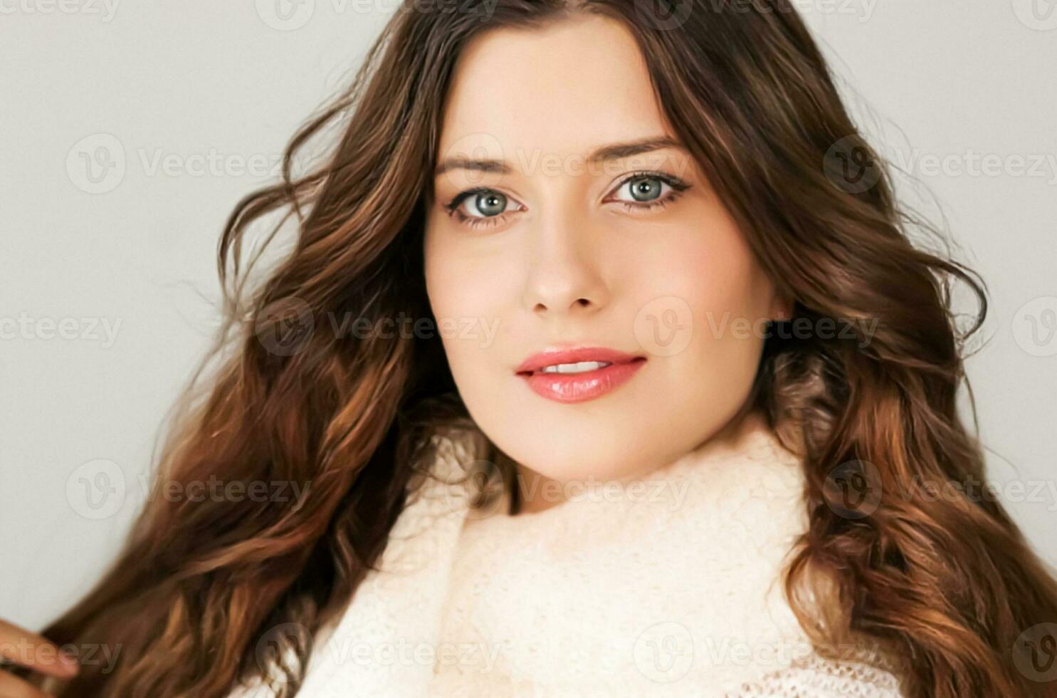 Autumn winter fashion and knitwear, beautiful woman wearing warm knitted scarf photo