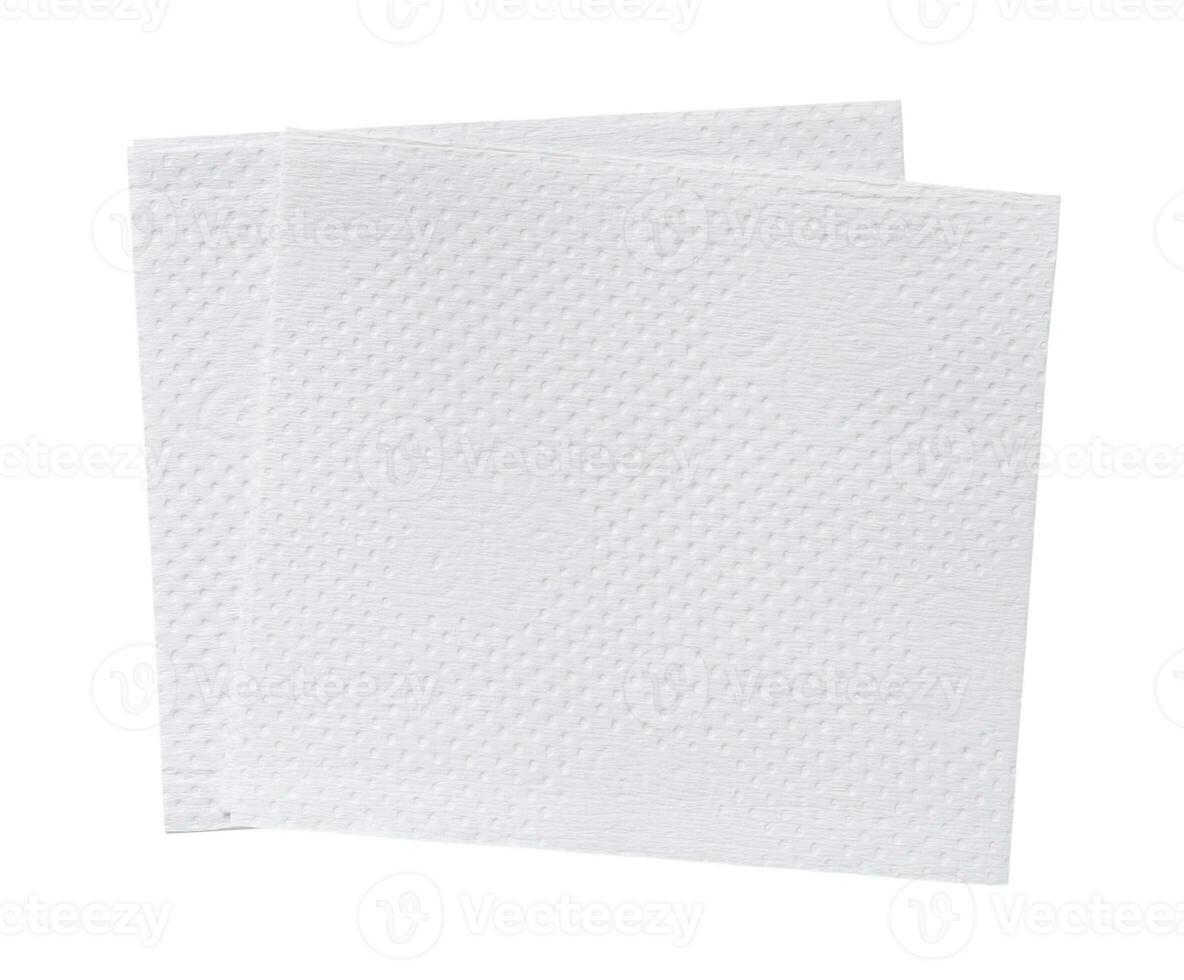 Top view of two folded pieces of white tissue paper or napkin in stack isolated on white background with clipping path photo