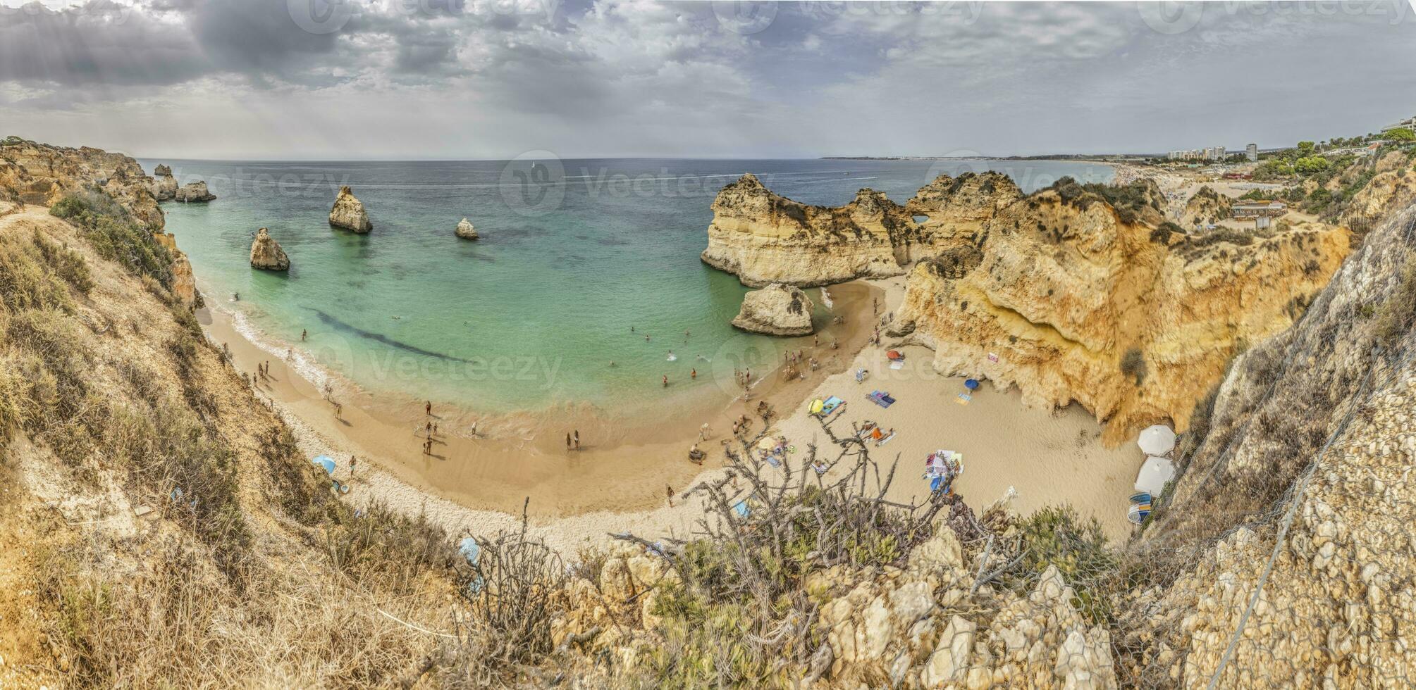 Panoramic view over Praia do Prainha beach in Portuguese Algarve during daytime photo