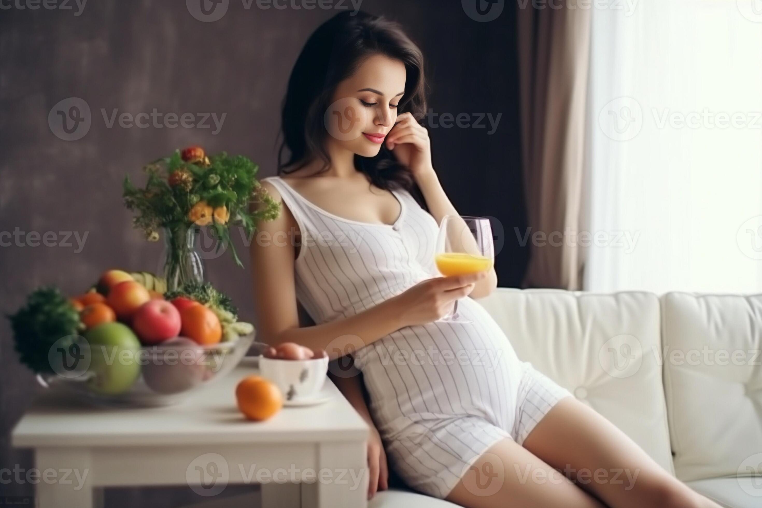 Healthy eating for me and my baby Beautiful pregnant woman eating a