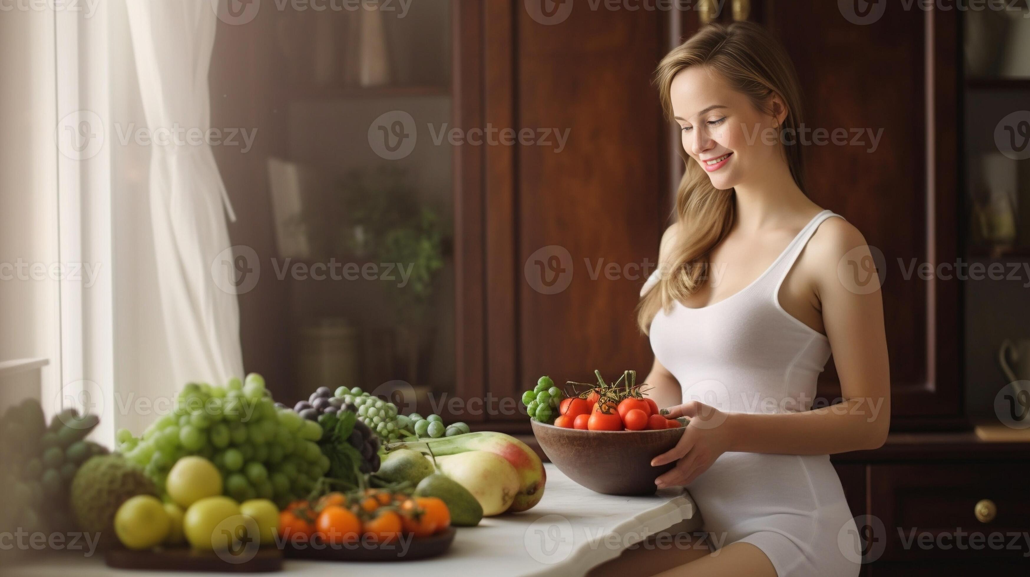 Healthy eating for me and my baby Beautiful pregnant woman eating a