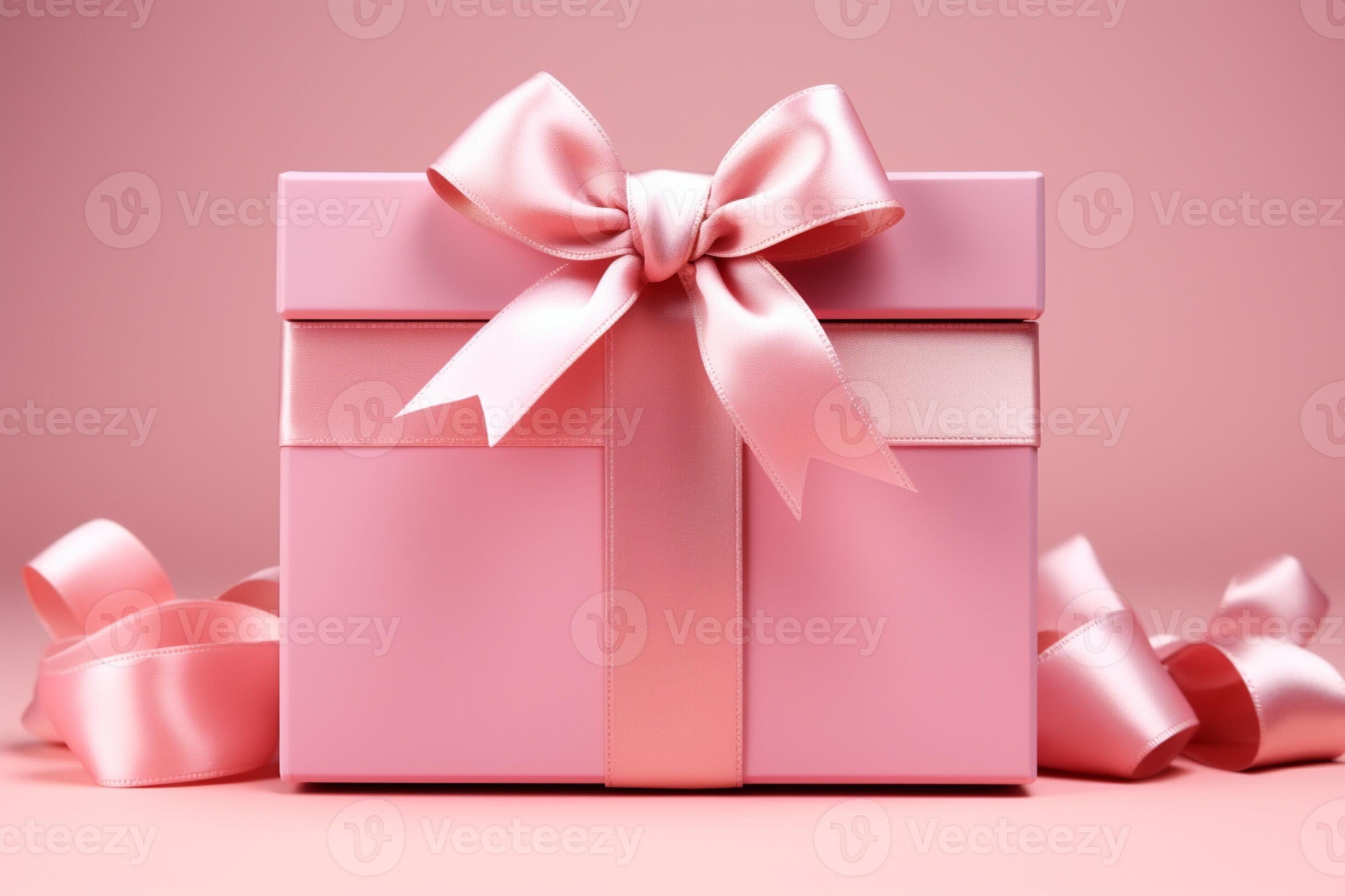 Soft pastel Blank pink gift box with ribbon on isolated pink backdrop ...