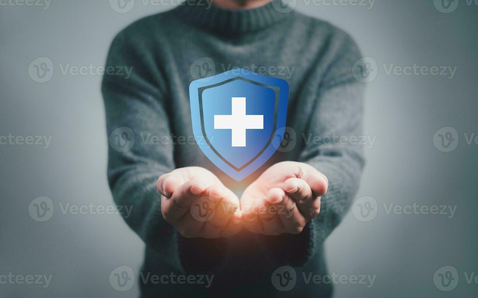 The concept of health insurance and Medical welfare ,man is holding plus icon represents protection Receiving benefits. Health insurance and access to treatment. health care planning photo