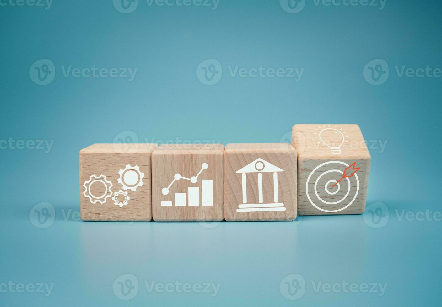 Wood cube block stacking with icon.Concept of business strategy and goal action plan. photo