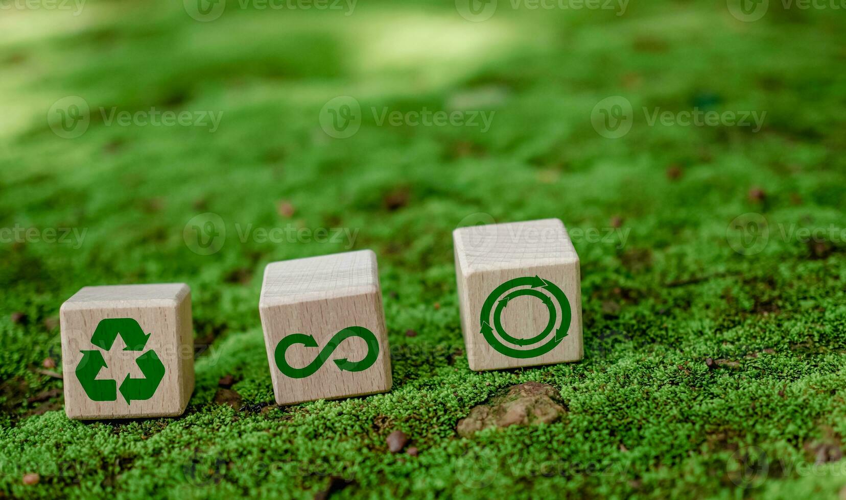 Concepts of waste reduction, pollution, reuse, efficient use of resources. Environmental protection sign by recycling on circular wooden board on nature background. photo