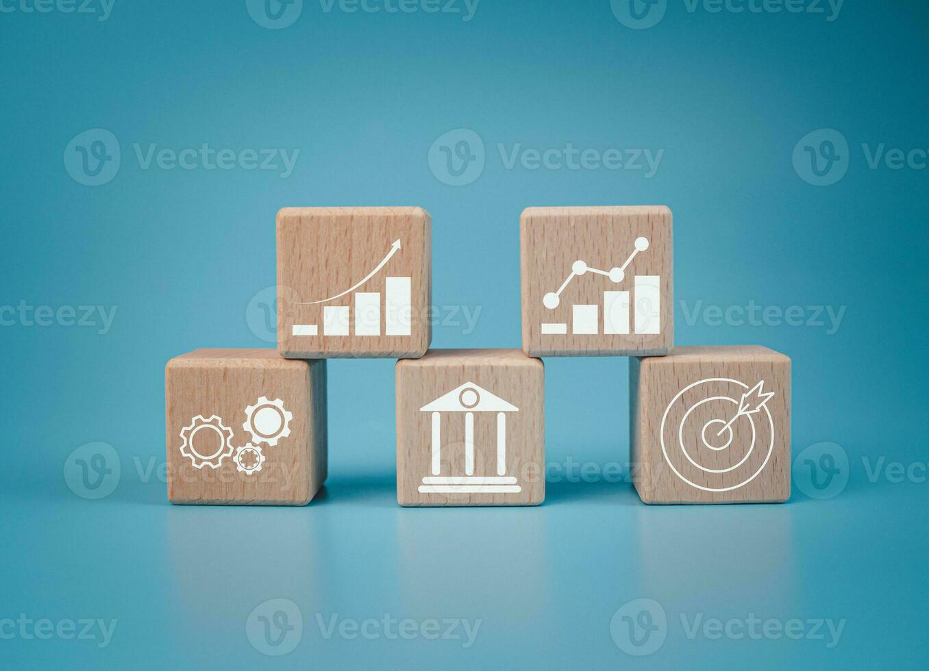 Wood cube block stacking with icon.Concept of business strategy and goal action plan. photo