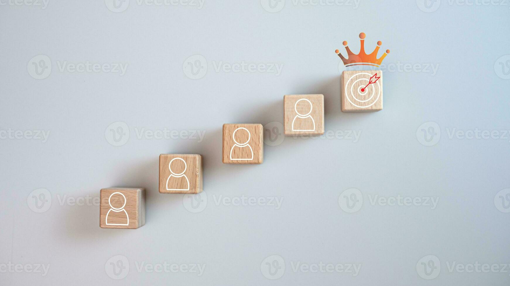 wooden block which prints a target icon and business symbol on white background. Business goals and objectives concept. business competition. business target concept. photo