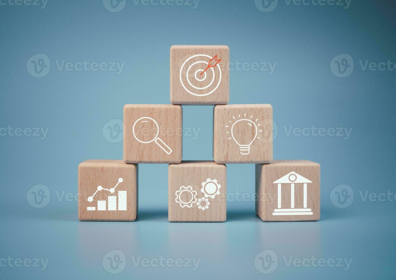 Wood cube block stacking with icon.Concept of business strategy and goal action plan. photo