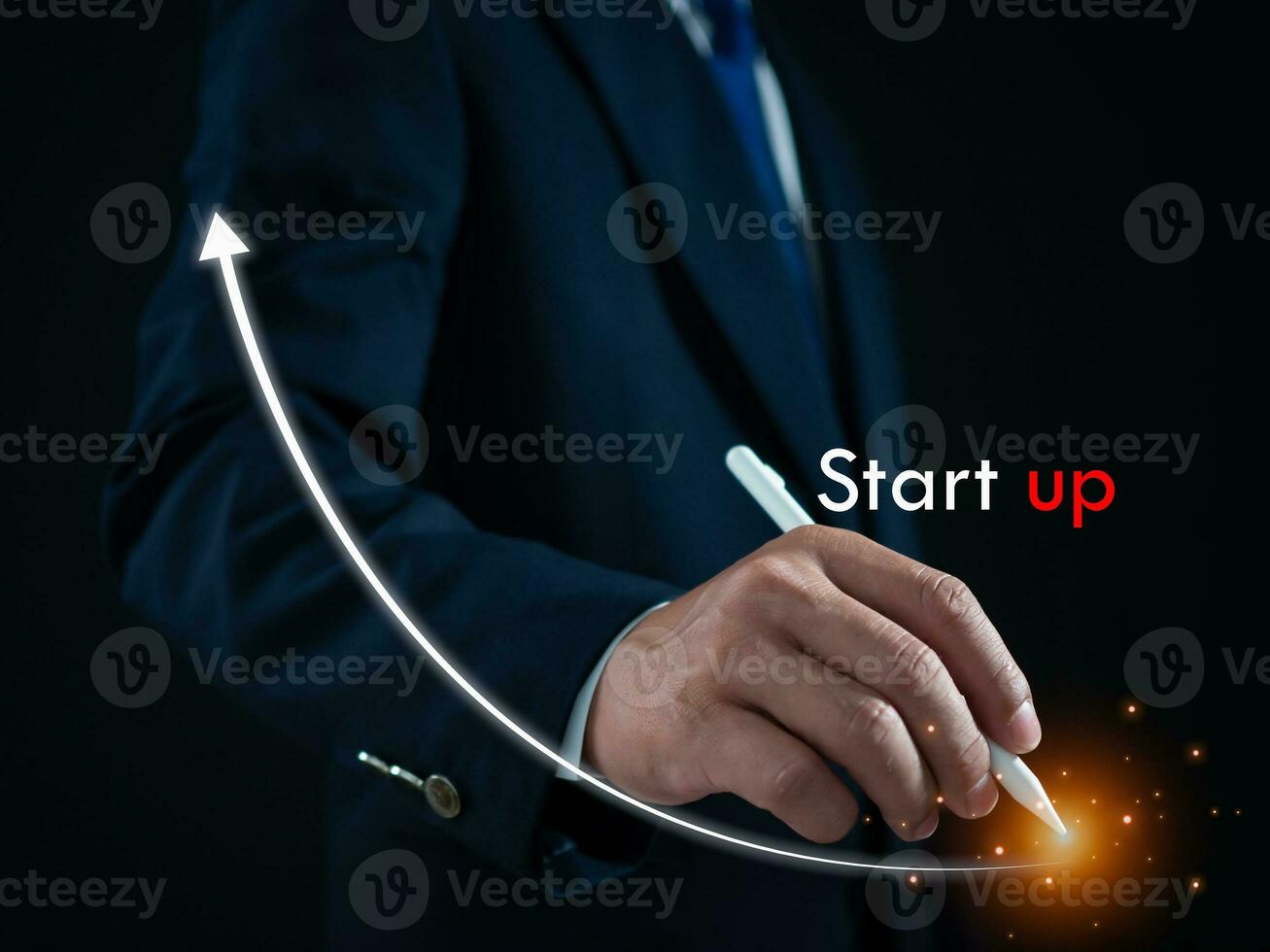 Businessman presses the pen at the starting point to start a business. Startup concept. Business concept. photo