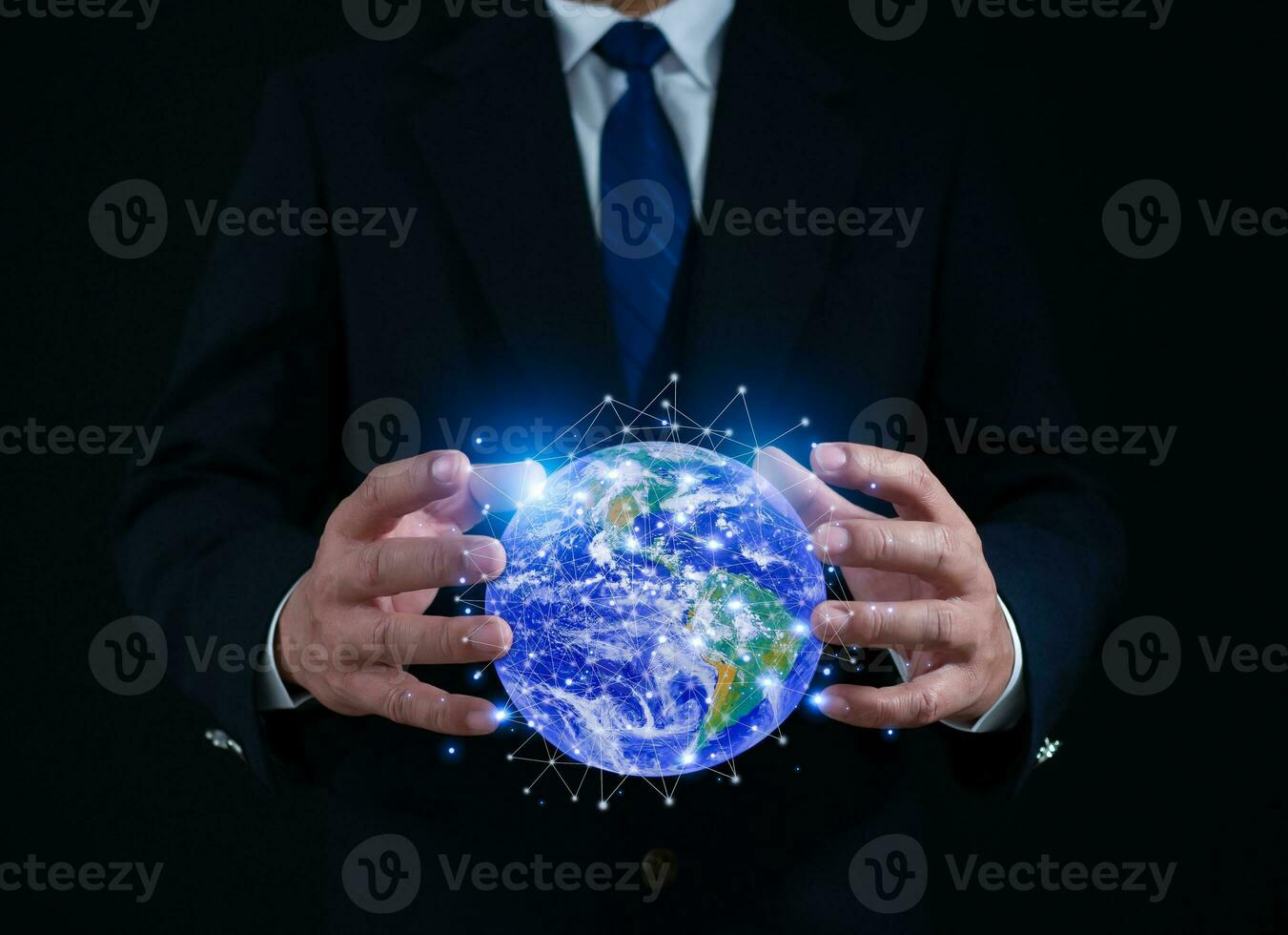 Businessman holding virtual global communication network. Business global internet connection application technology and digital marketing, Financial and banking, Digital link tech, big data. photo