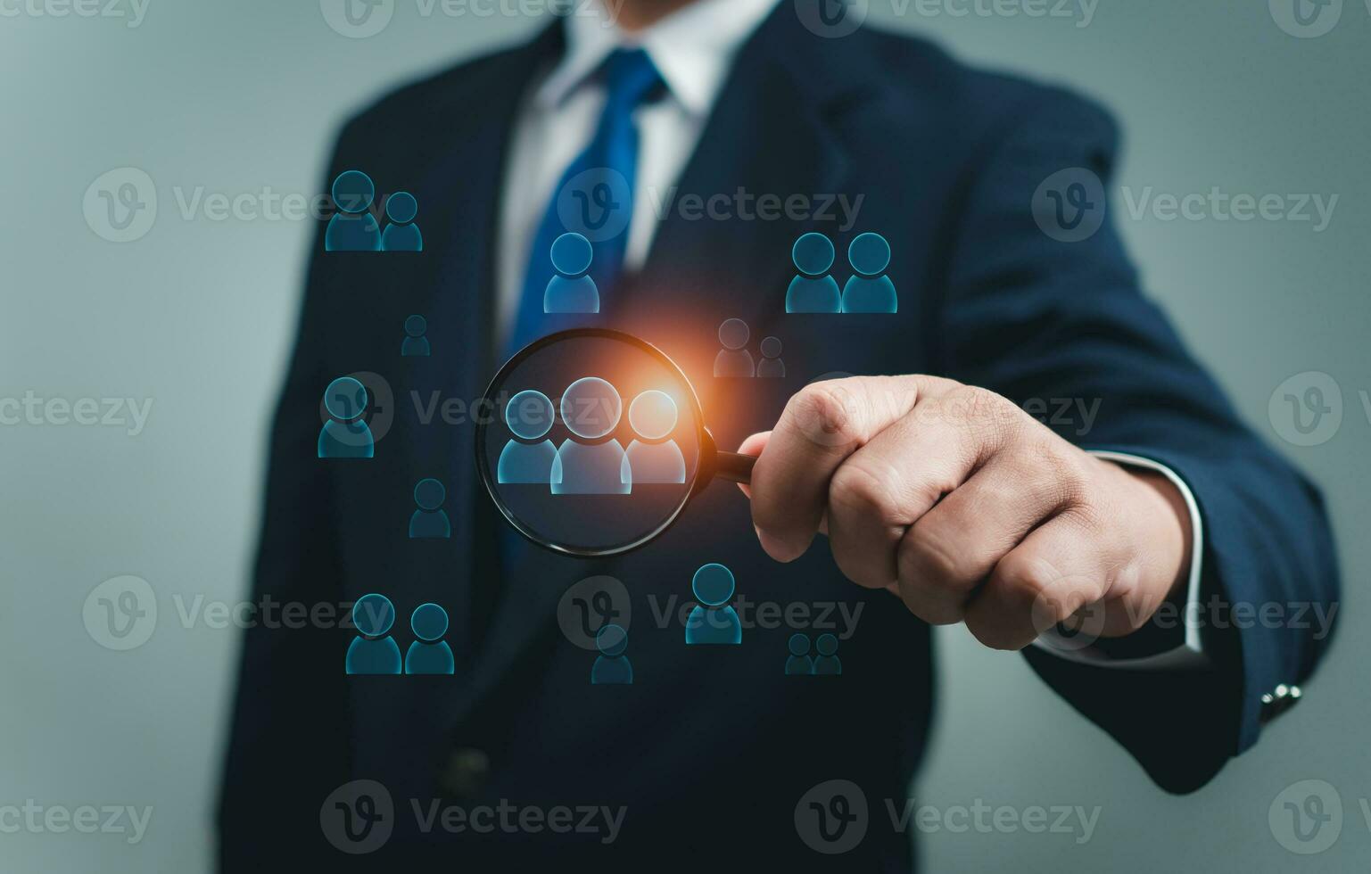 Business people use a magnifying glass to find business target groups,Target customer, Buyer persona, Customer behavior concept. Marketing plan and strategies. Personalization marketing photo