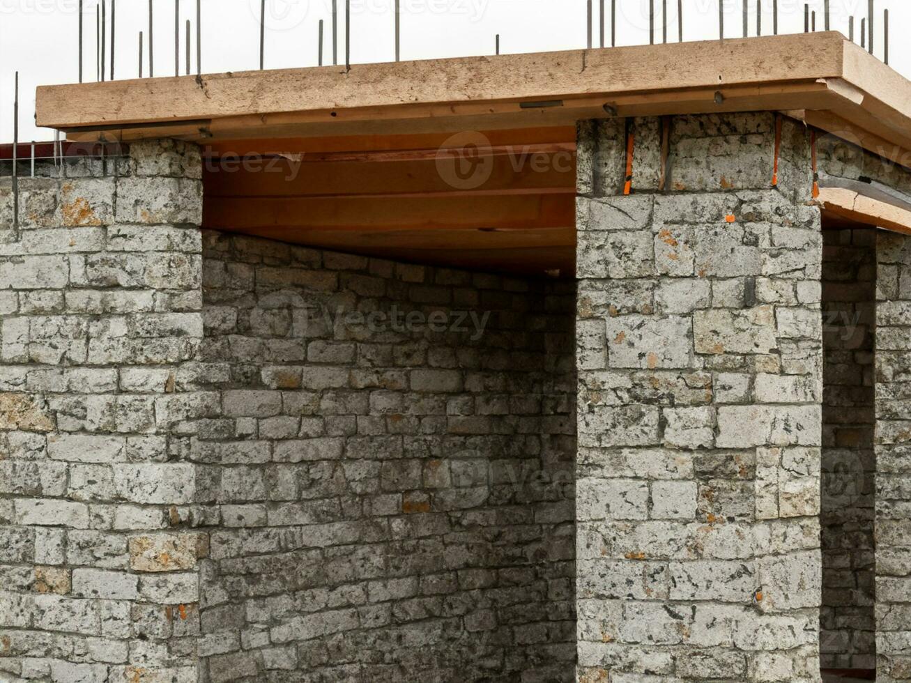 construction of a new house with a concrete wall photo