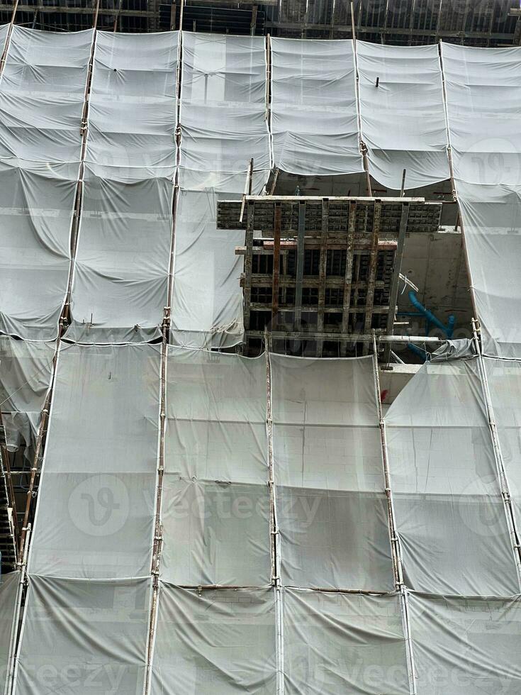 building under construction with scaffolding photo
