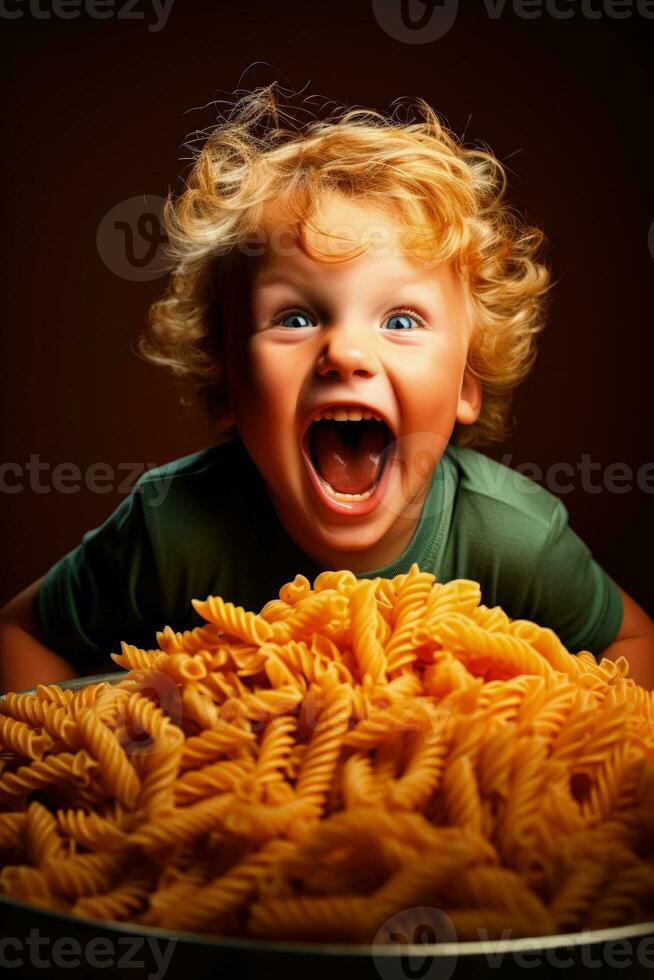 Young child delighting in pasta dinner isolated on a warm gradient background photo