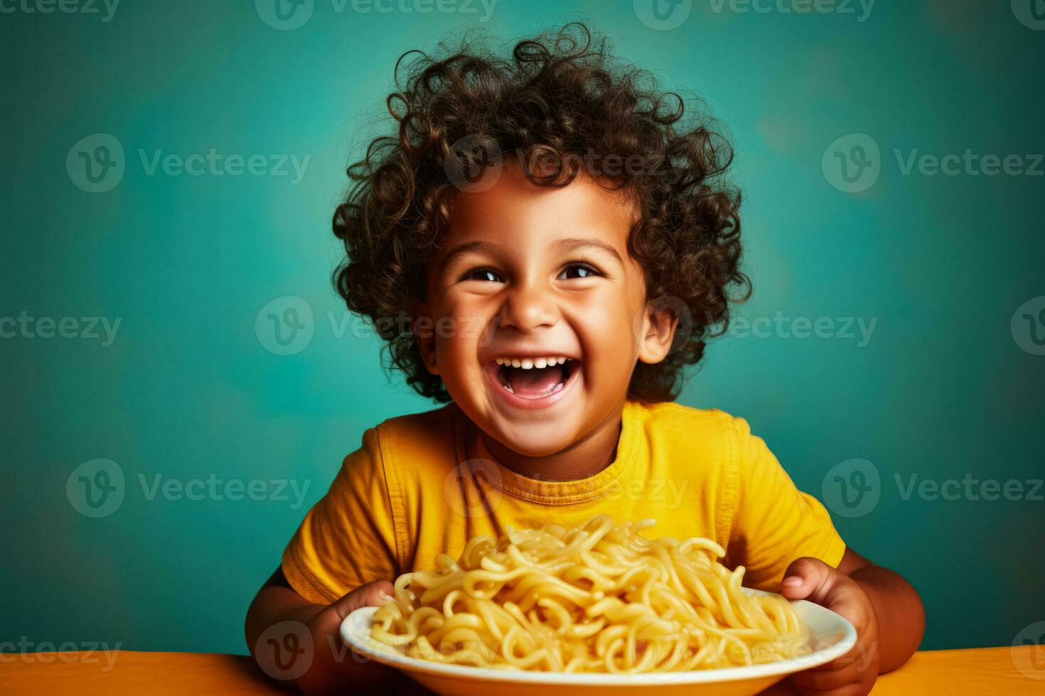 Young child enjoying pasta dinner at Italian restaurant isolated on a gradient background photo