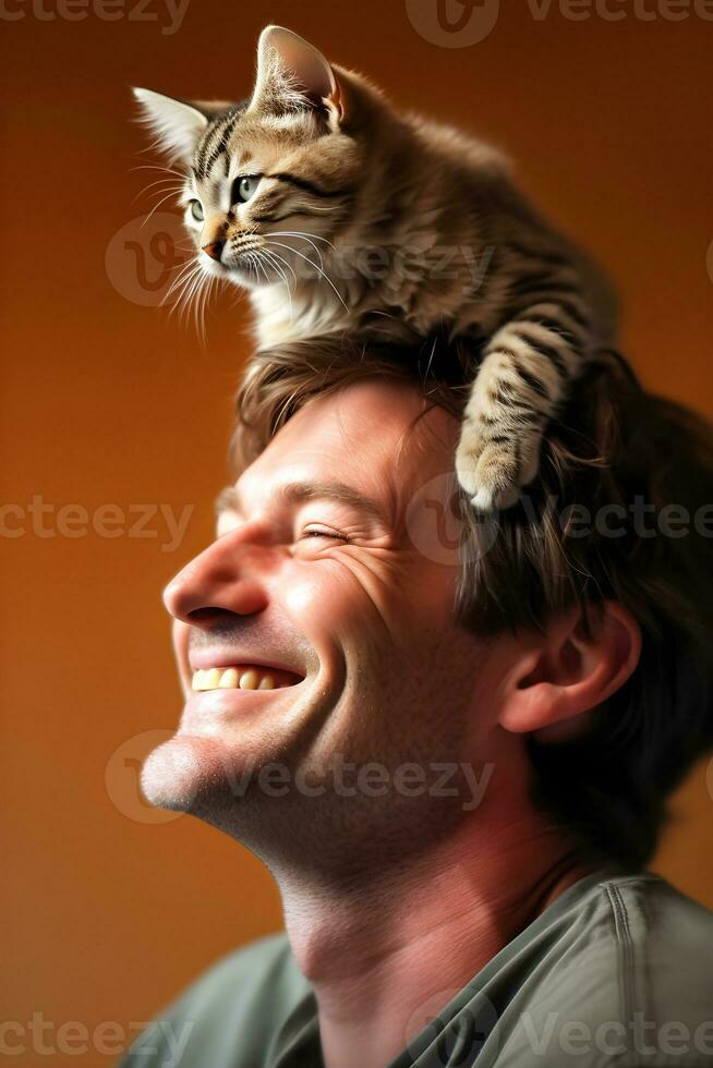 a kitten perched on the head of a man laughing happily AI generated photo