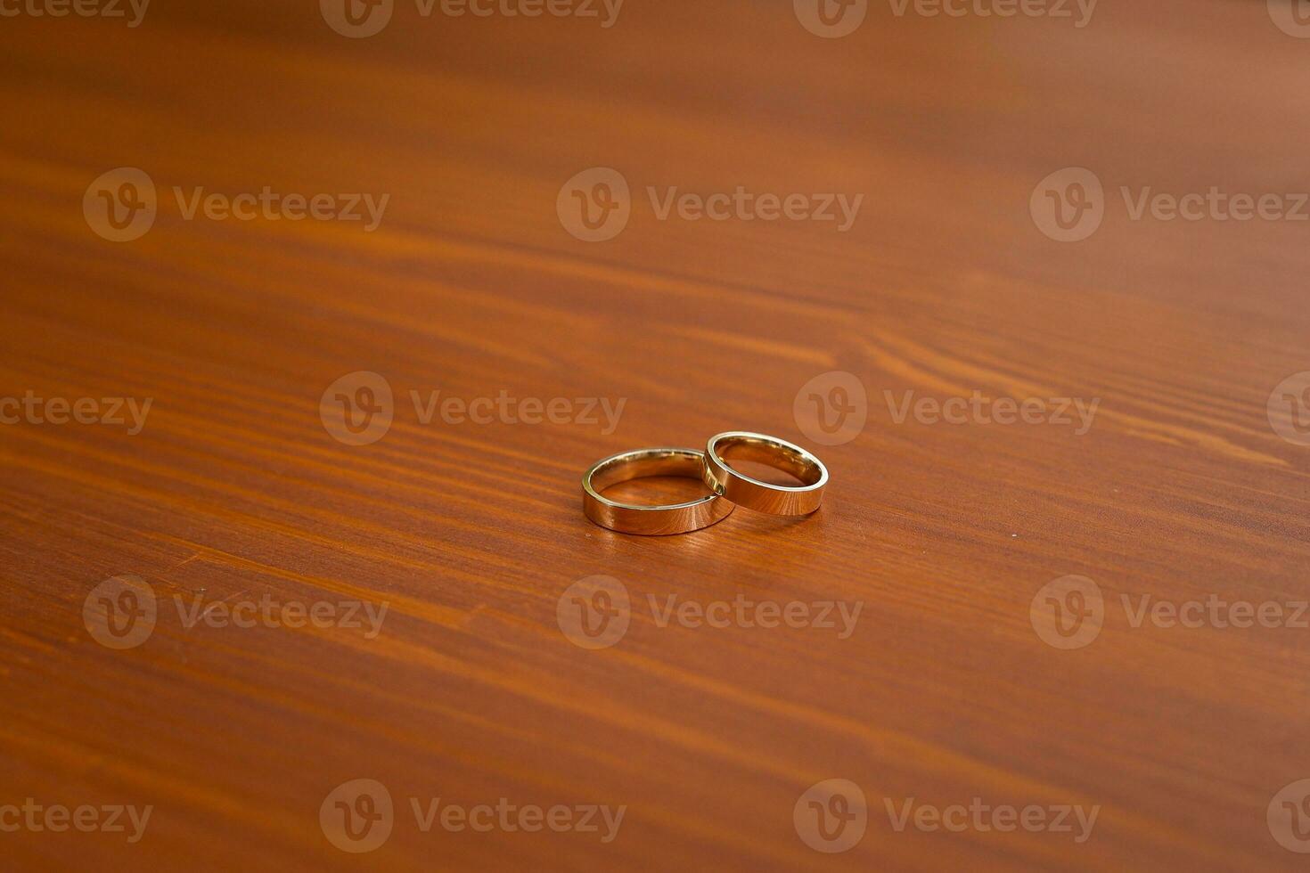 Detail of two golden wedding rings photo