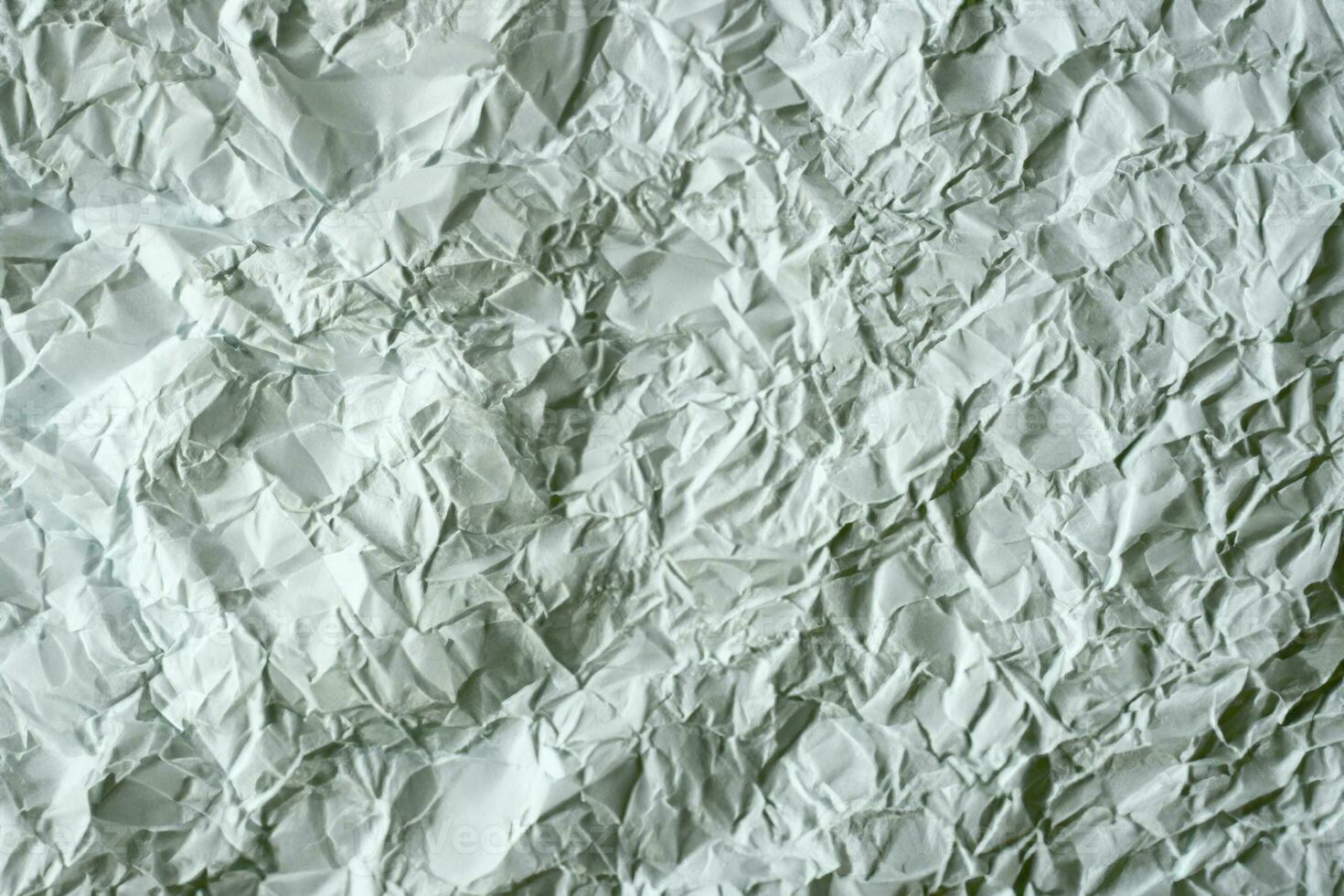 Crumpled white paper. photo