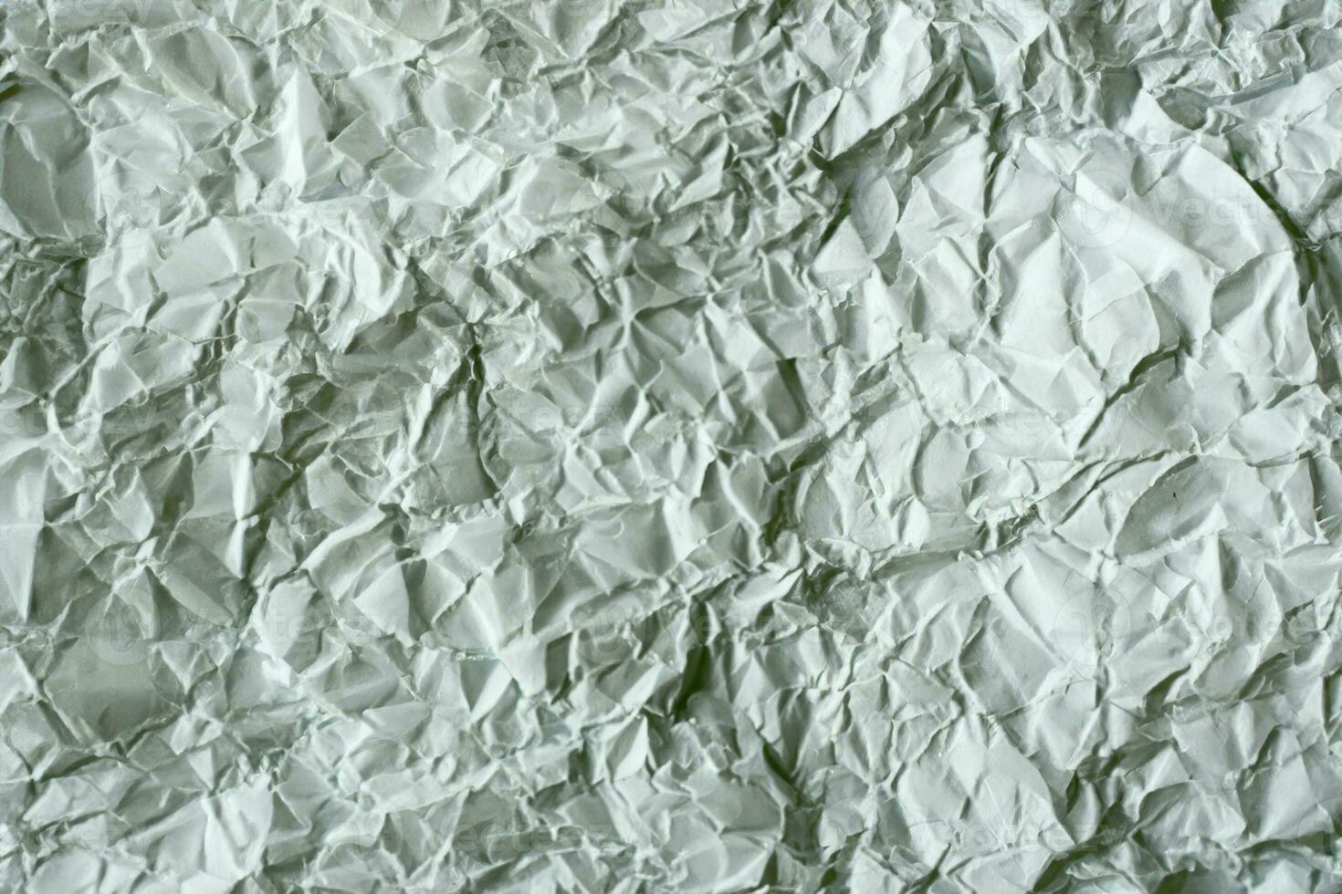 Crumpled white paper. photo