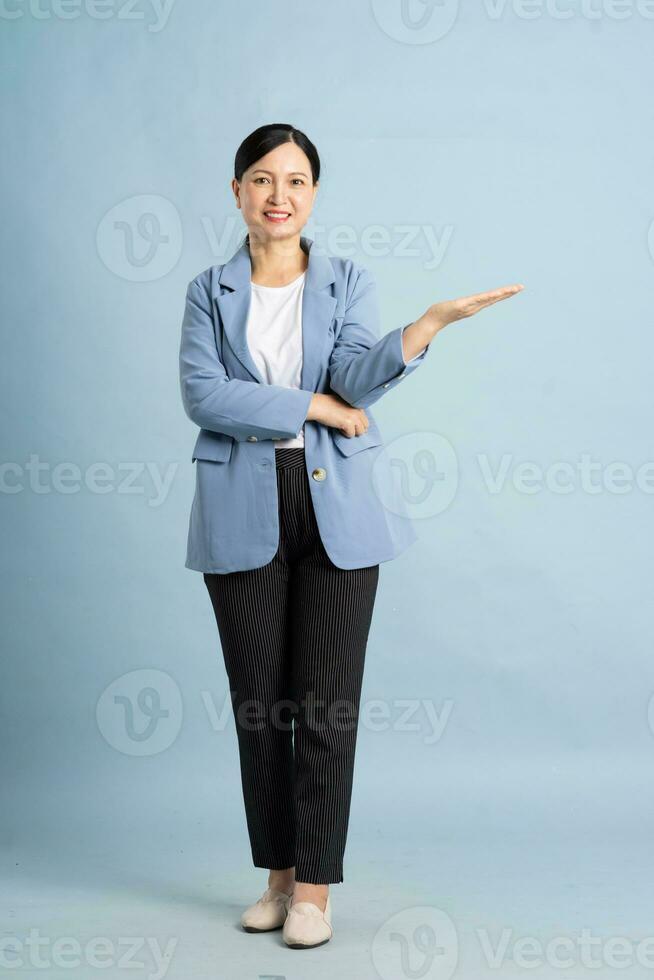 full body photo of a middle-aged businesswoman