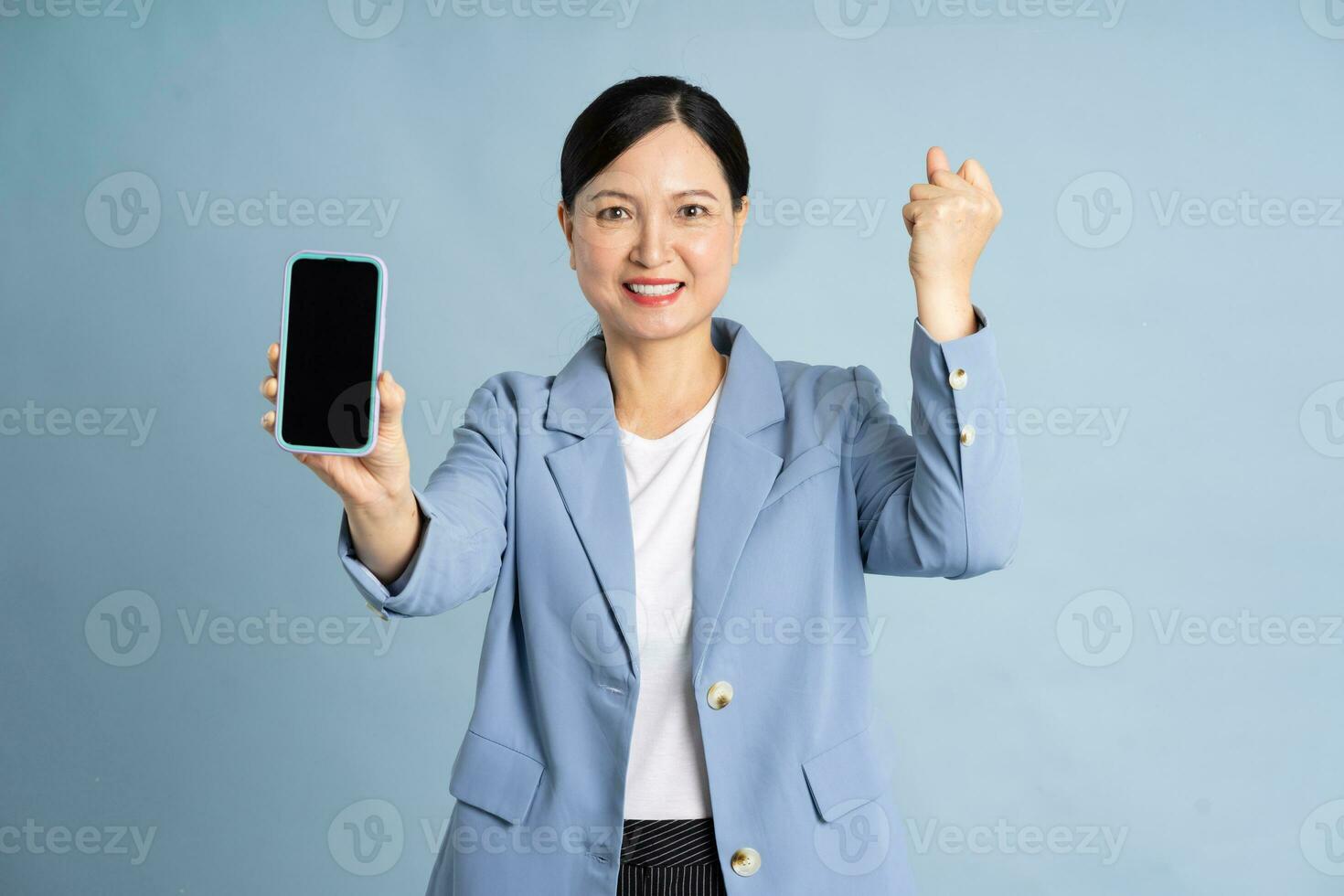 Portrait of a businesswoman using a smart phone photo