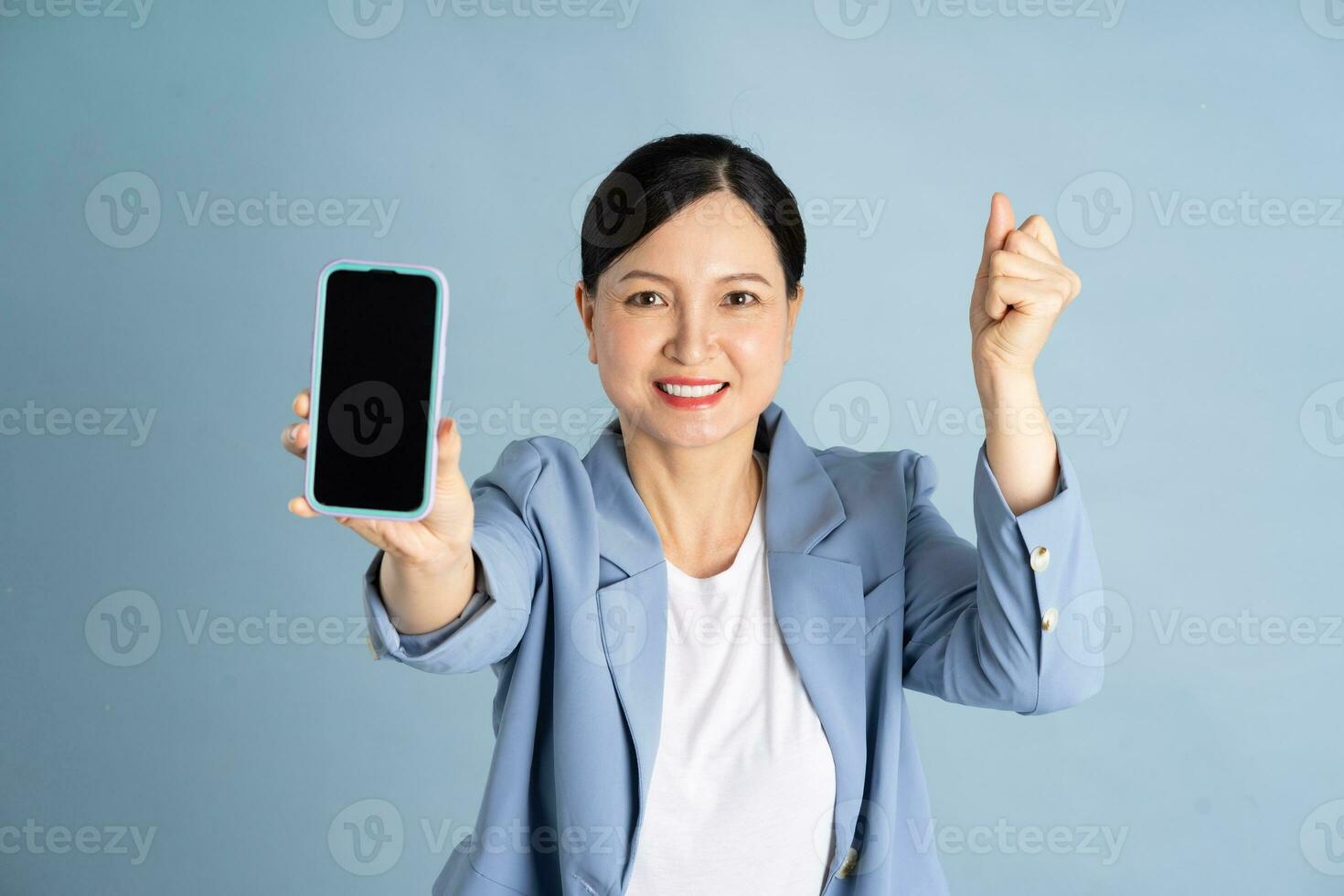 Portrait of a businesswoman using a smartphone photo